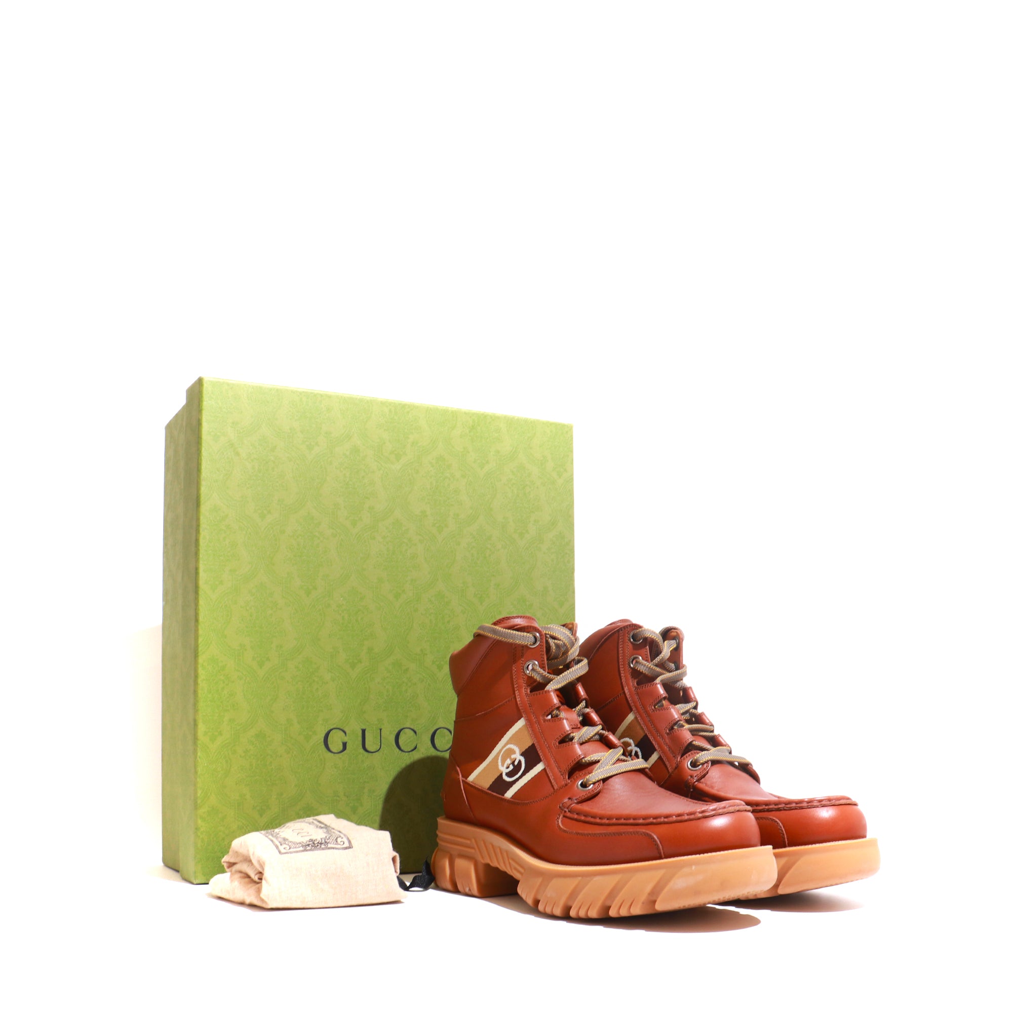 GUCCI - Boots Quebec en cuir marron à logo (T42)