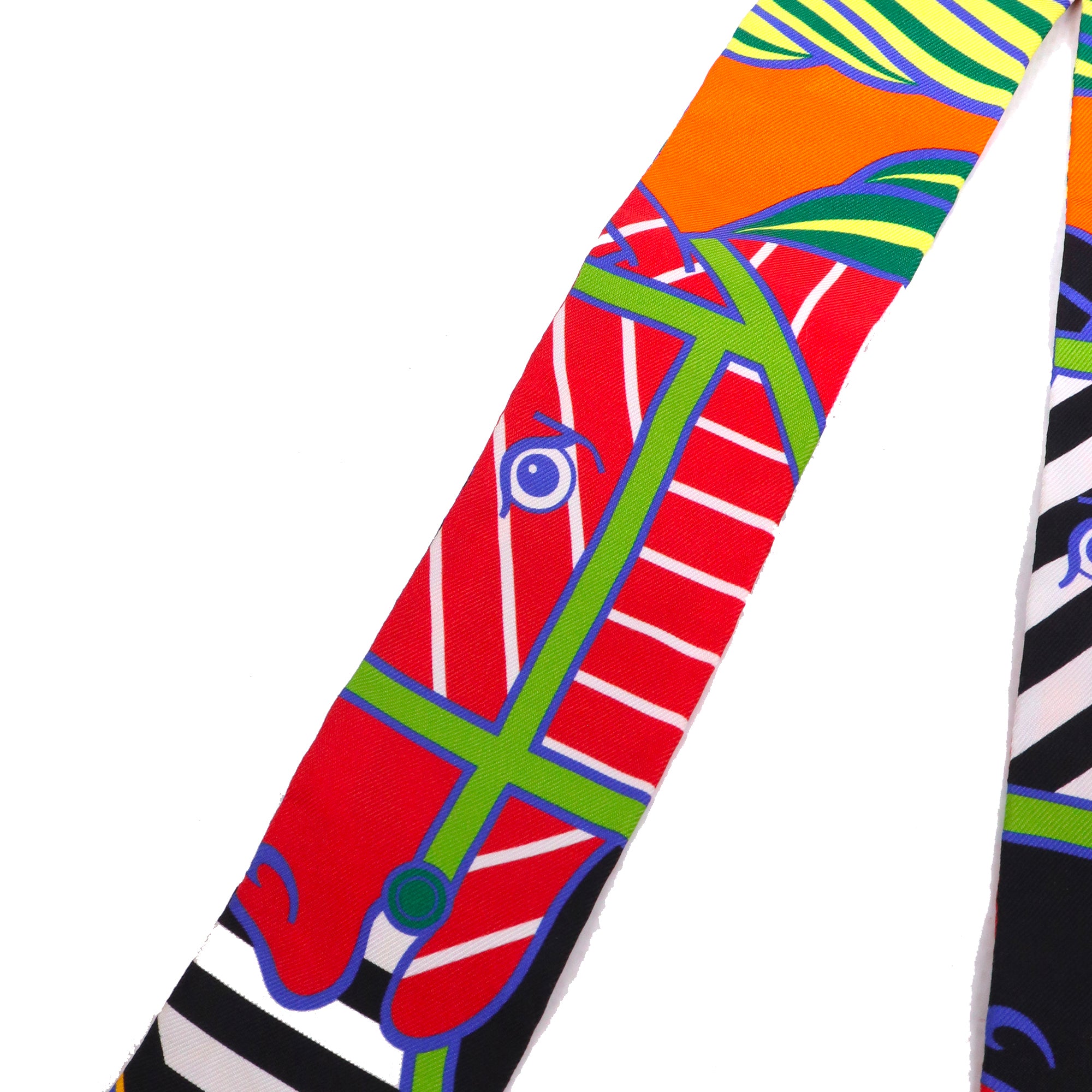 HERMÈS - Twilly Quadrige Hermès en soie multicolore