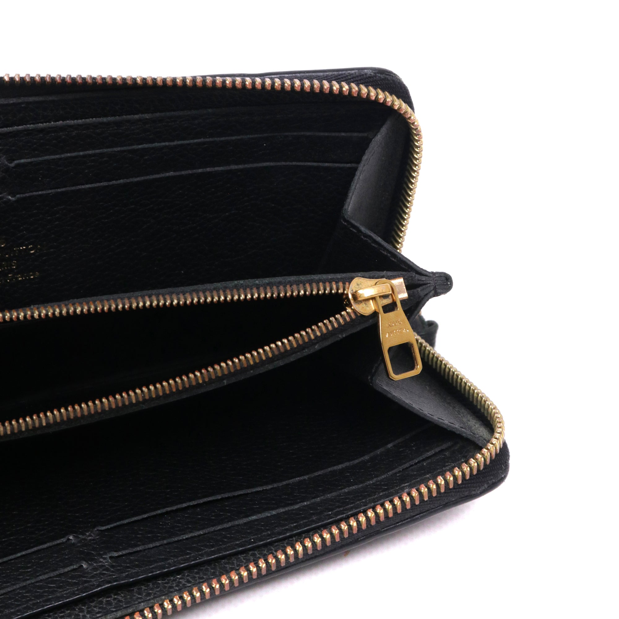 LOUIS VUITTON - Portefeuille Clémence Louis Vuitton en cuir empreinte noir