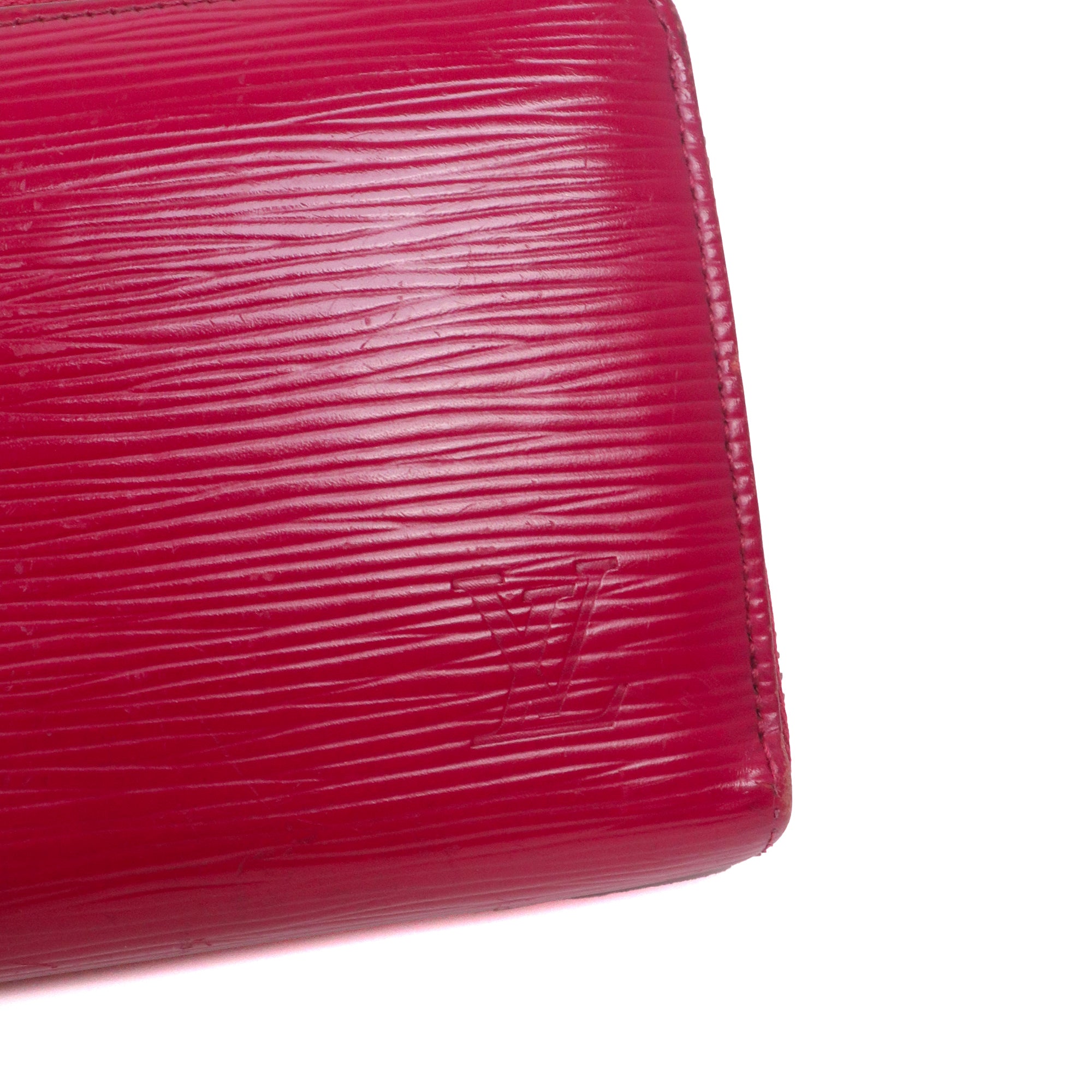 LOUIS VUITTON - Portefeuille Zippy Louis Vuitton en cuir épi fuchsia