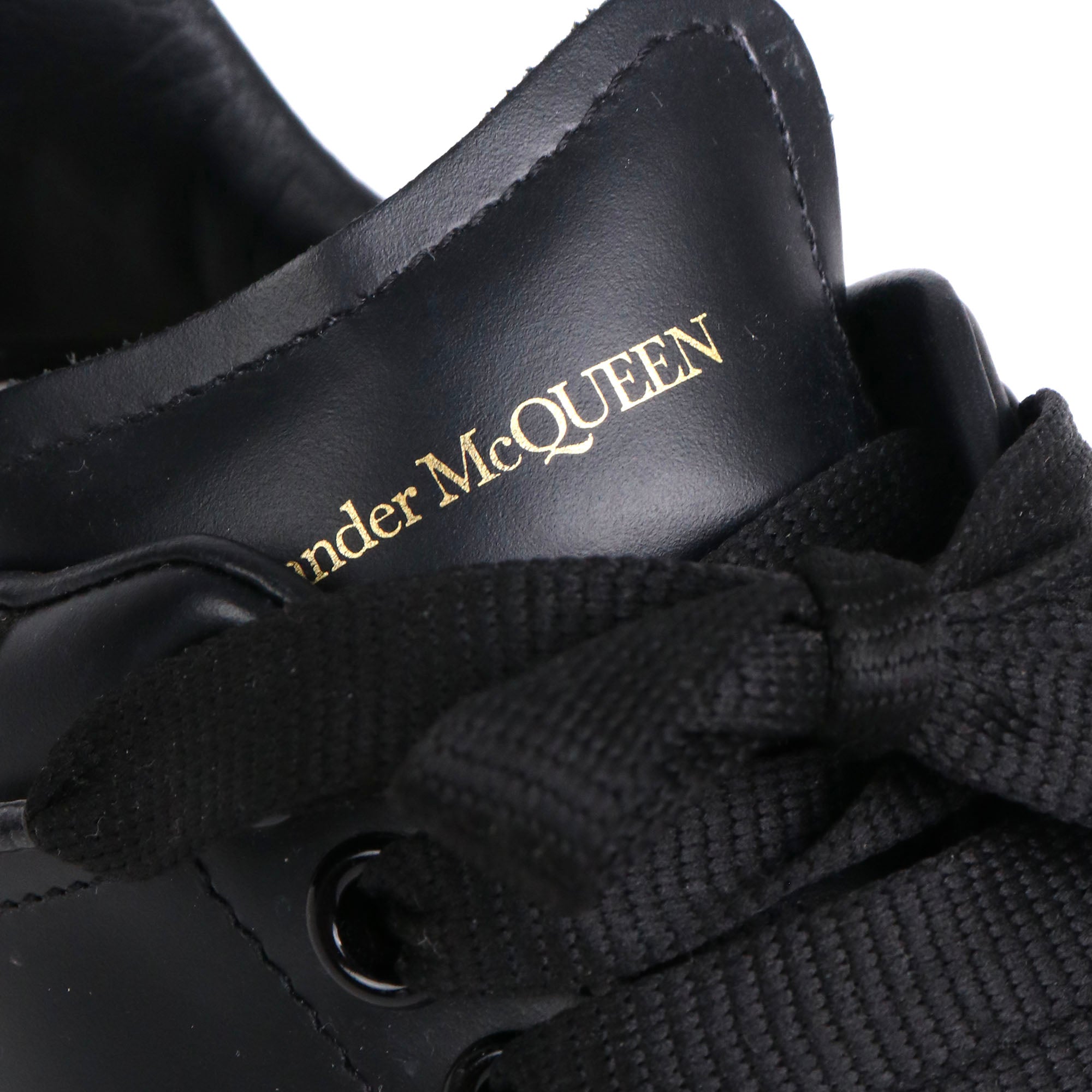 ALEXANDER MCQUEEN - Oversize sneakers in black leather (T39)