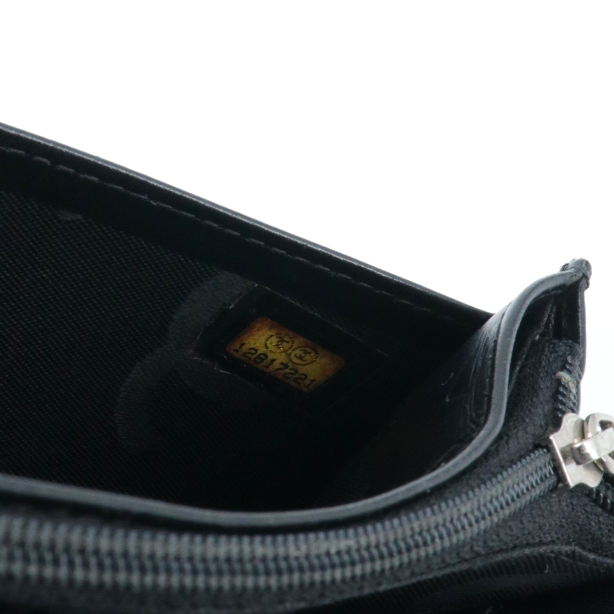 CHANEL - Black quilted leather wallet
