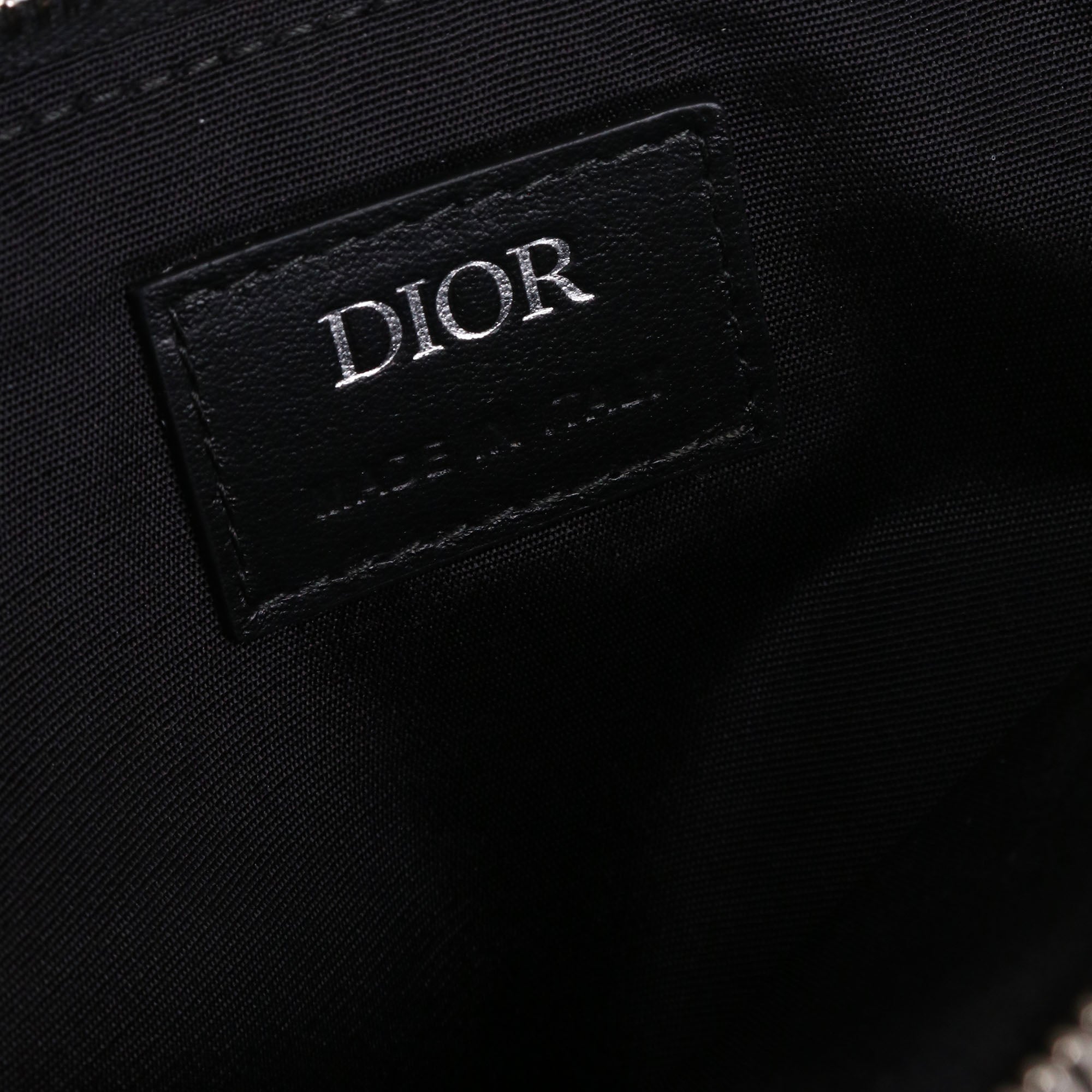 DIOR - Pochette Diamant Dior en toile enduite violette
