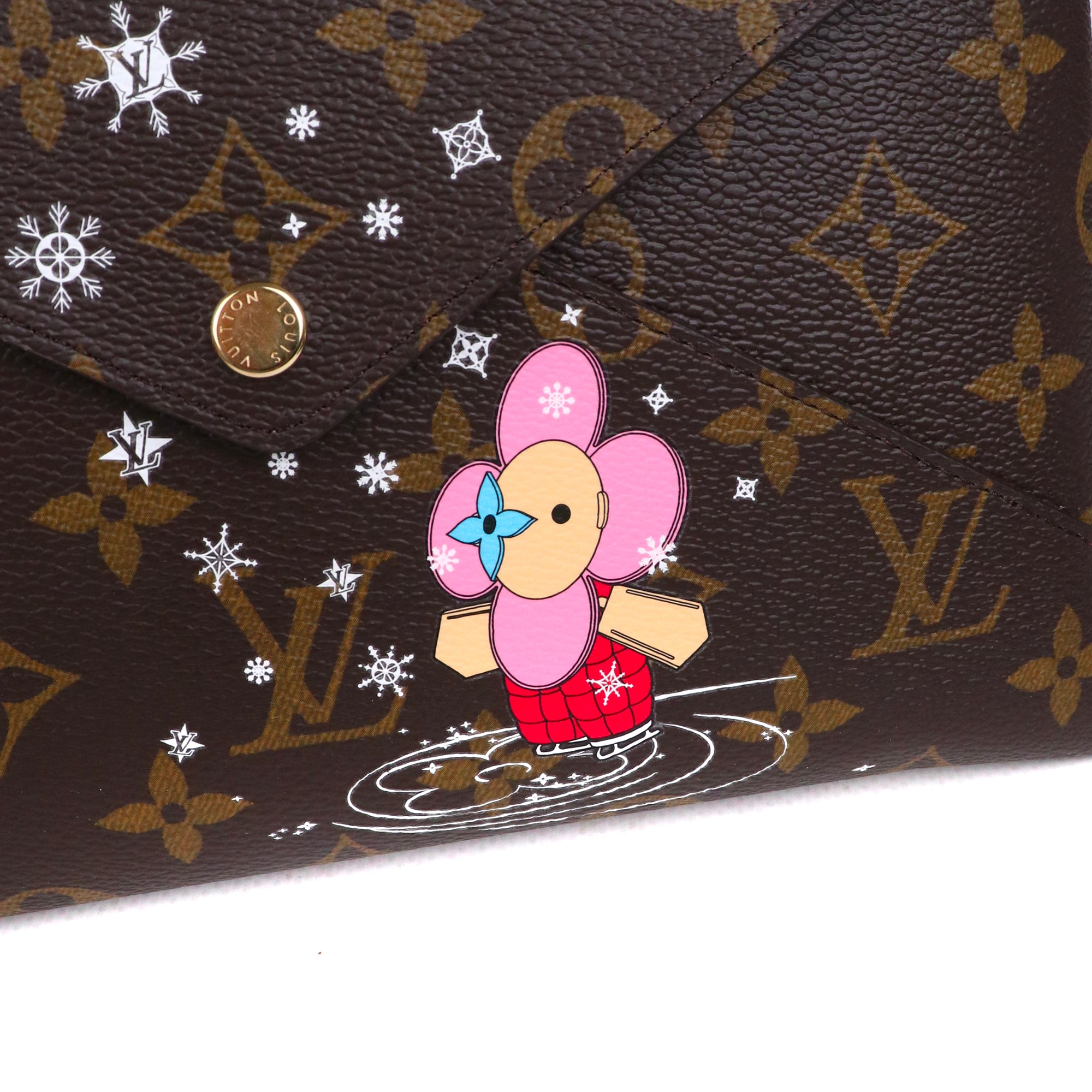 LOUIS VUITTON - Pochette Kirigami Louis Vuitton en toile monogrammée édition limitée Noël 2023