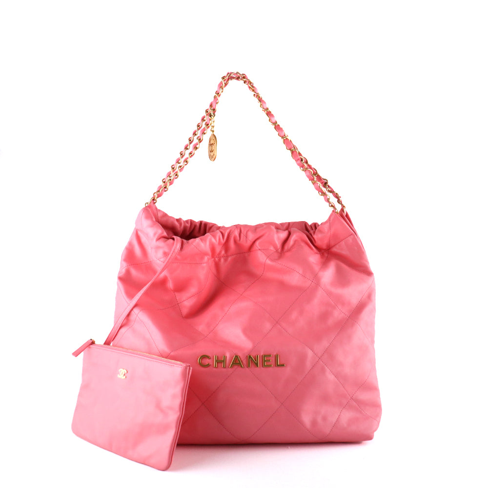 CHANEL - Chanel 22 shopping bag in pink quilted leather and clutch