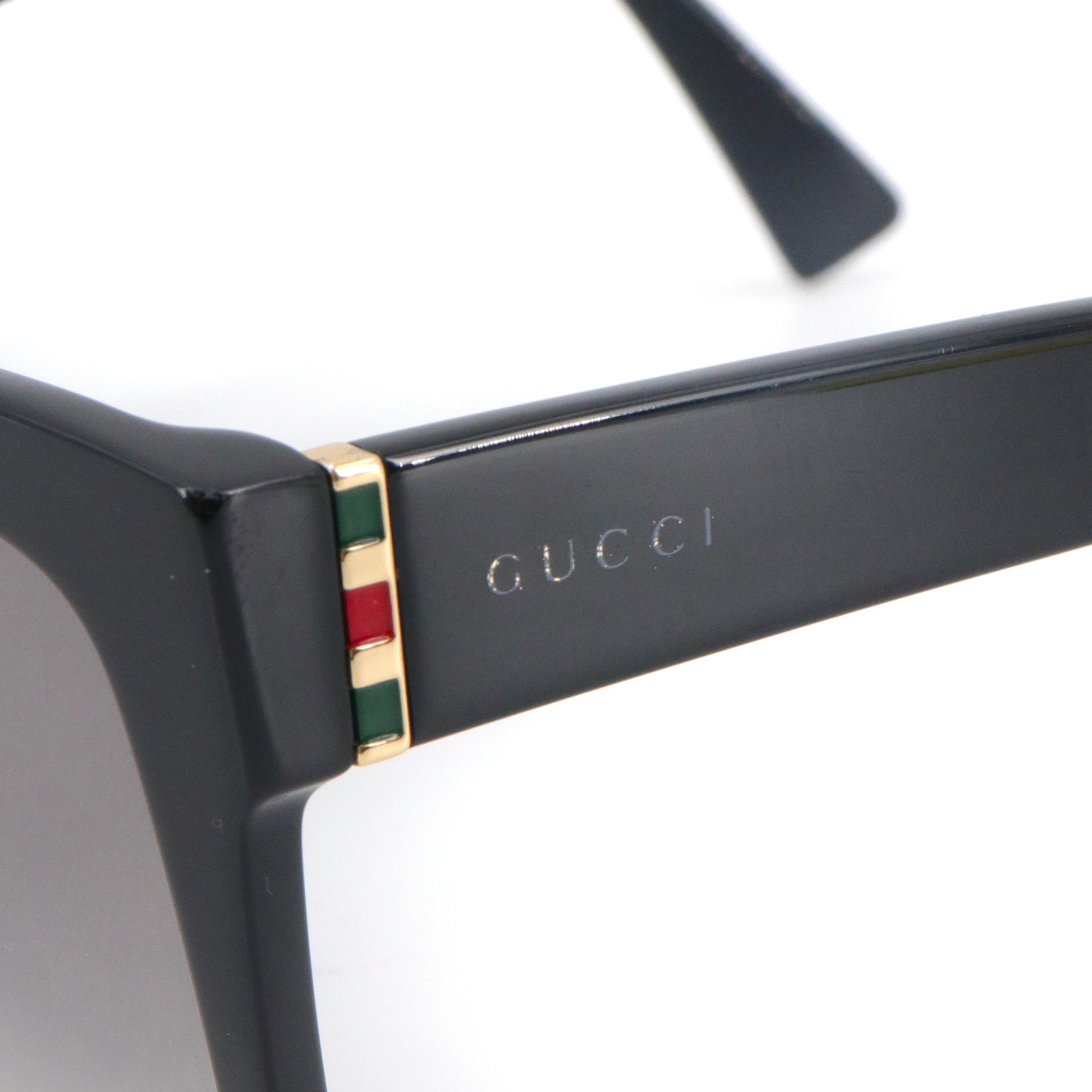 GUCCI - Lunettes de soleil Gucci en plastique noir