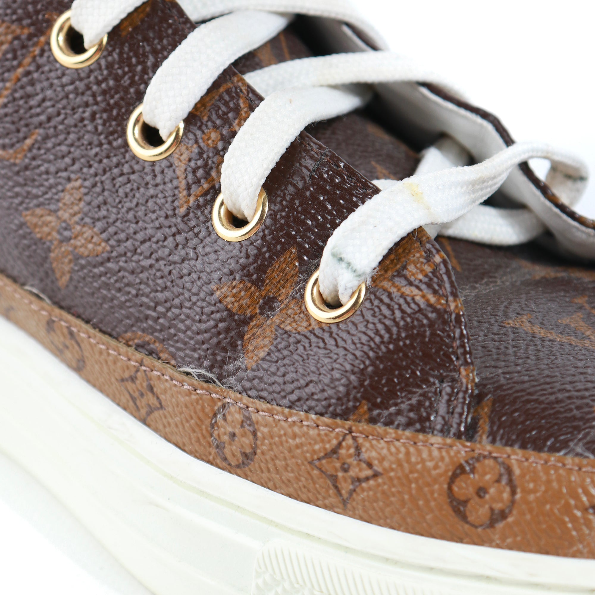 LOUIS VUITTON - Sneakers montantes en toile enduite monogrammée (T40)