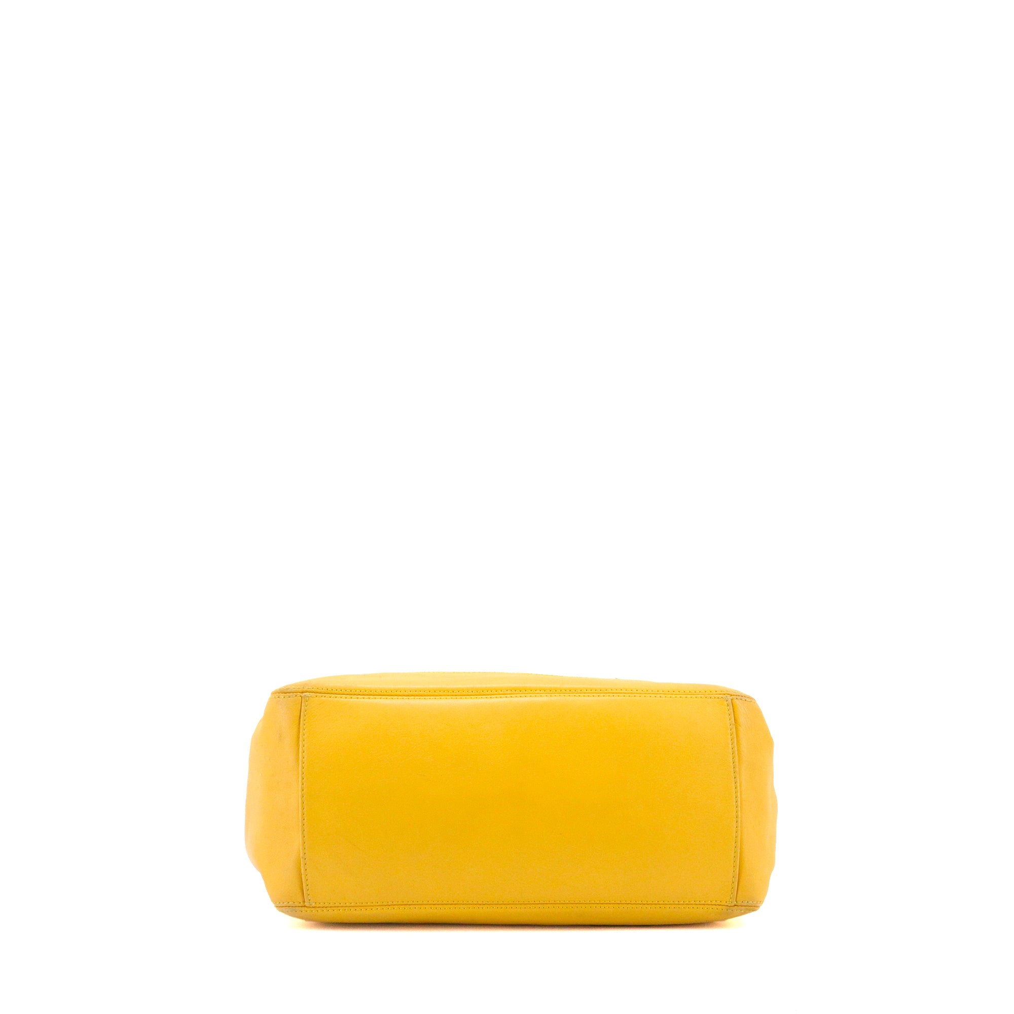 CHANEL - Chanel Drawstring Ring Handle Handbag in Vintage Yellow Leather