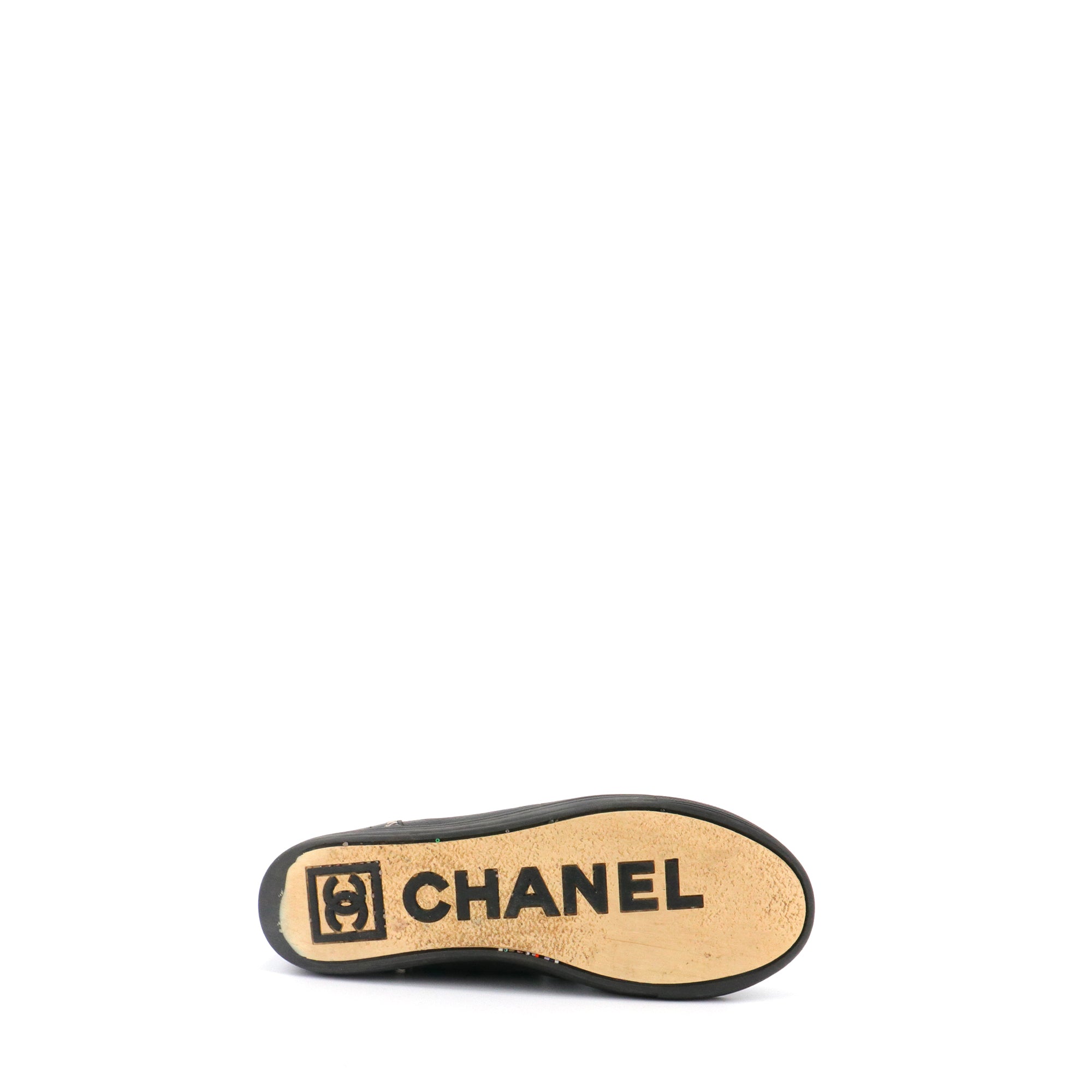 CHANEL - Sneakers montantes CC Chanel en cuir noir (T38.5)