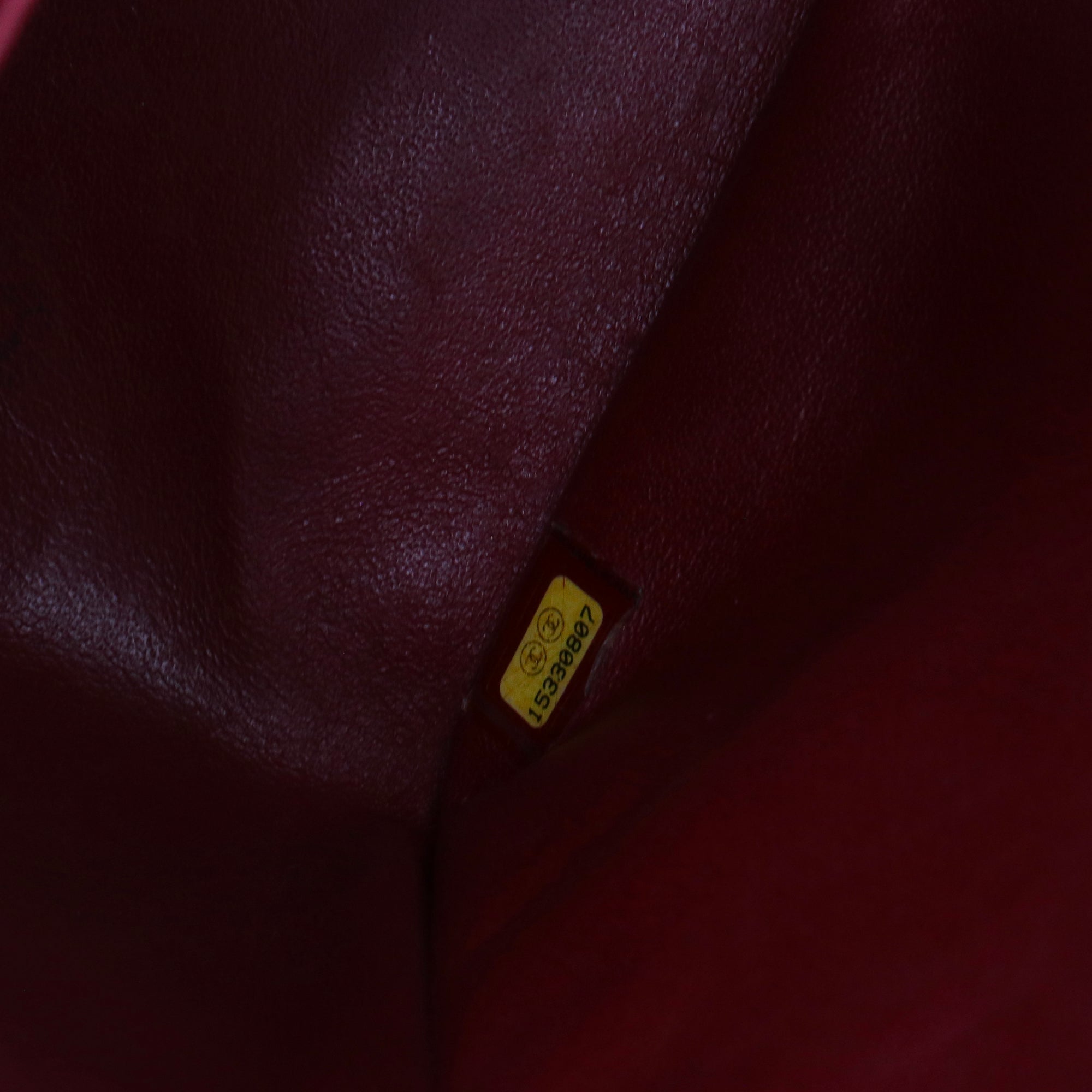 CHANEL - Sac à bandoulière Classique/Timeless Jumbo Chanel en cuir caviar bordeaux