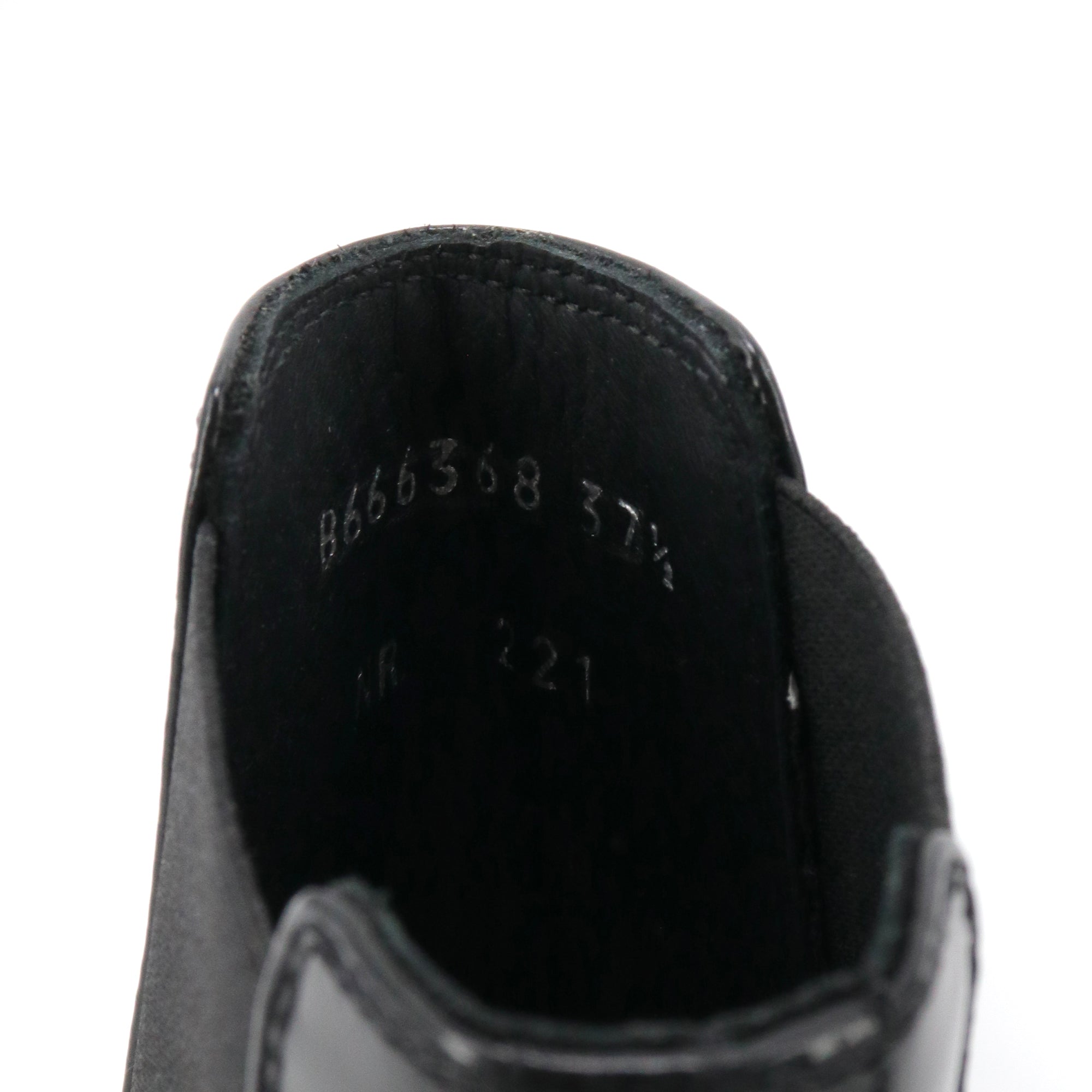 ALEXANDER MCQUEEN - Oversize sneakers in black leather (T39)