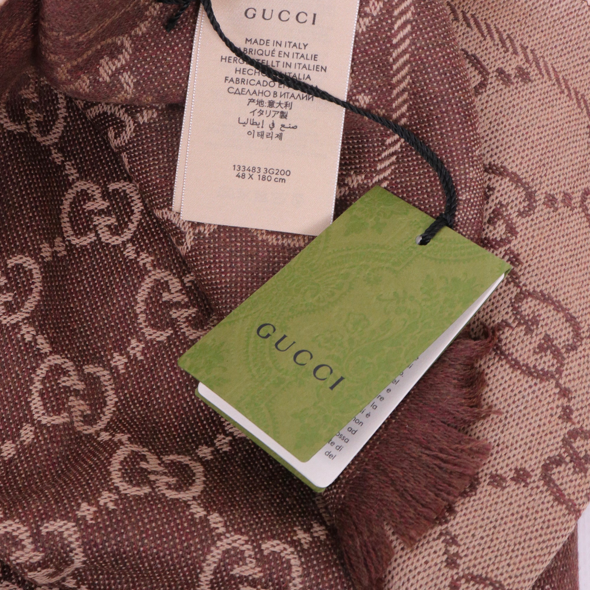 GUCCI - Echarpe Gucci en maille avec jacquard GG marron