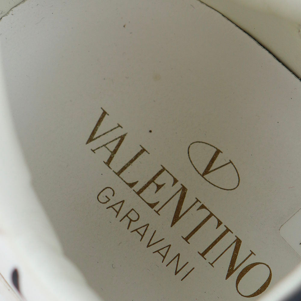 VALENTINO - Sneakers Rockstud en cuir blanc motif zèbre (T36)