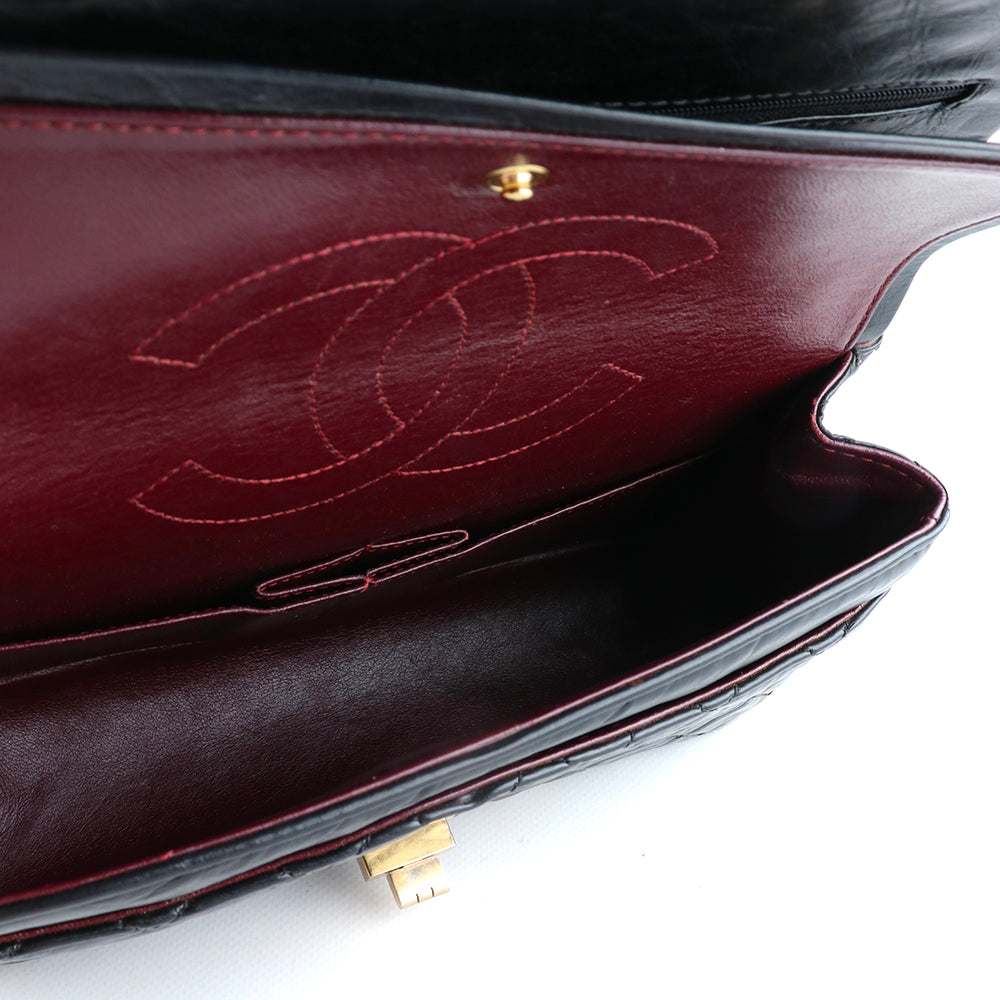 CHANEL - Sac à main 2.55 en cuir matelassé noir