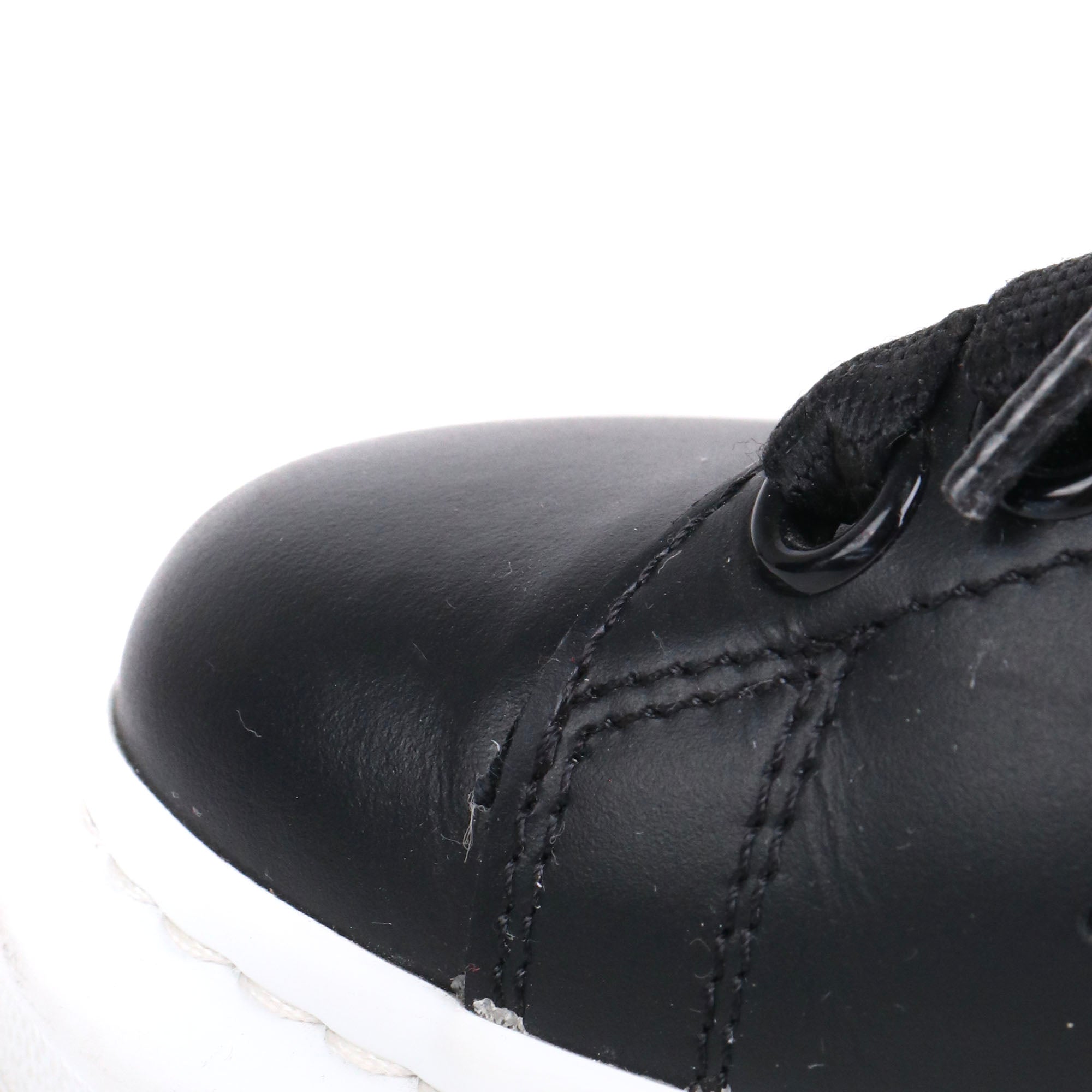 ALEXANDER MCQUEEN - Oversize sneakers in black leather (T39)