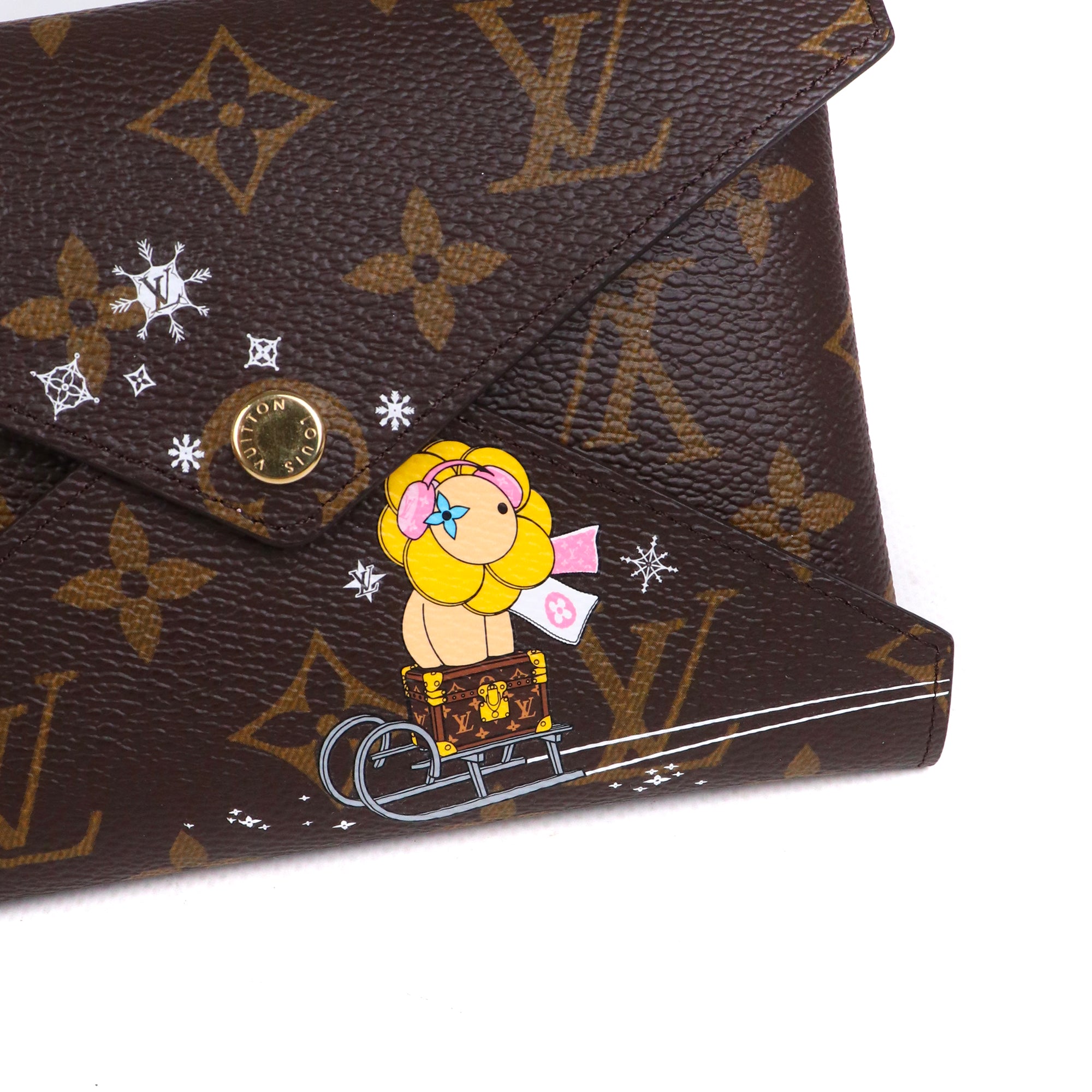 LOUIS VUITTON - Pochette Kirigami Louis Vuitton en toile monogrammée édition limitée Noël 2023