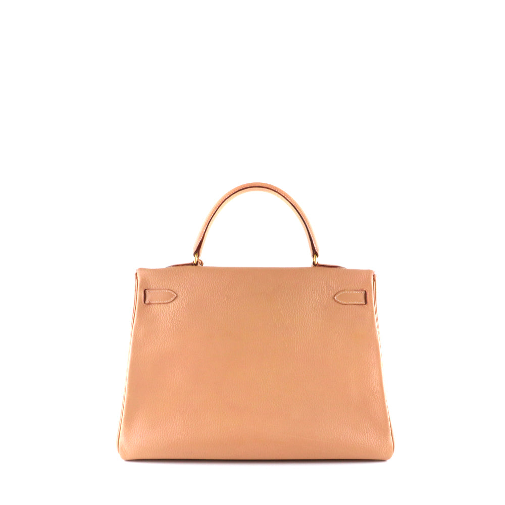 HERMÈS - Sac à main Kelly 35 en cuir togo rose ancien vintage