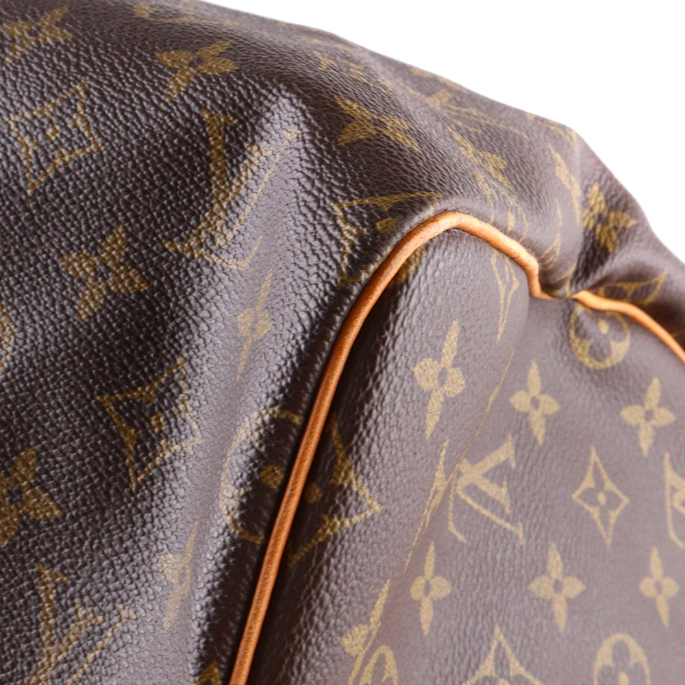 LOUIS VUITTON - Sac de voyage Keepall 55 à bandoulière en toile monogrammée vintage