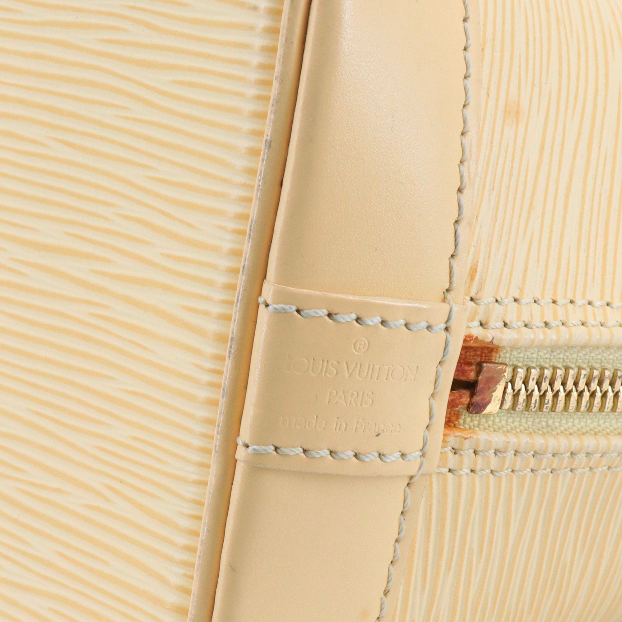 LOUIS VUITTON - Sac à main Alma PM Louis Vuitton en cuir épi jaune pastel