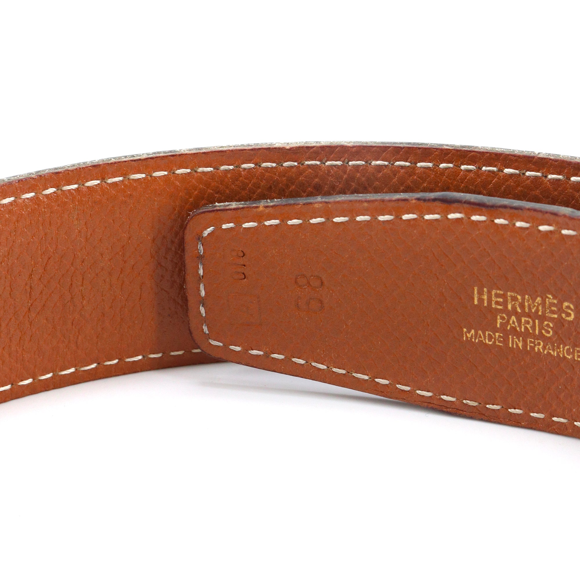 HERMÈS - Hermès reversible H belt in black and gold leather (T70)