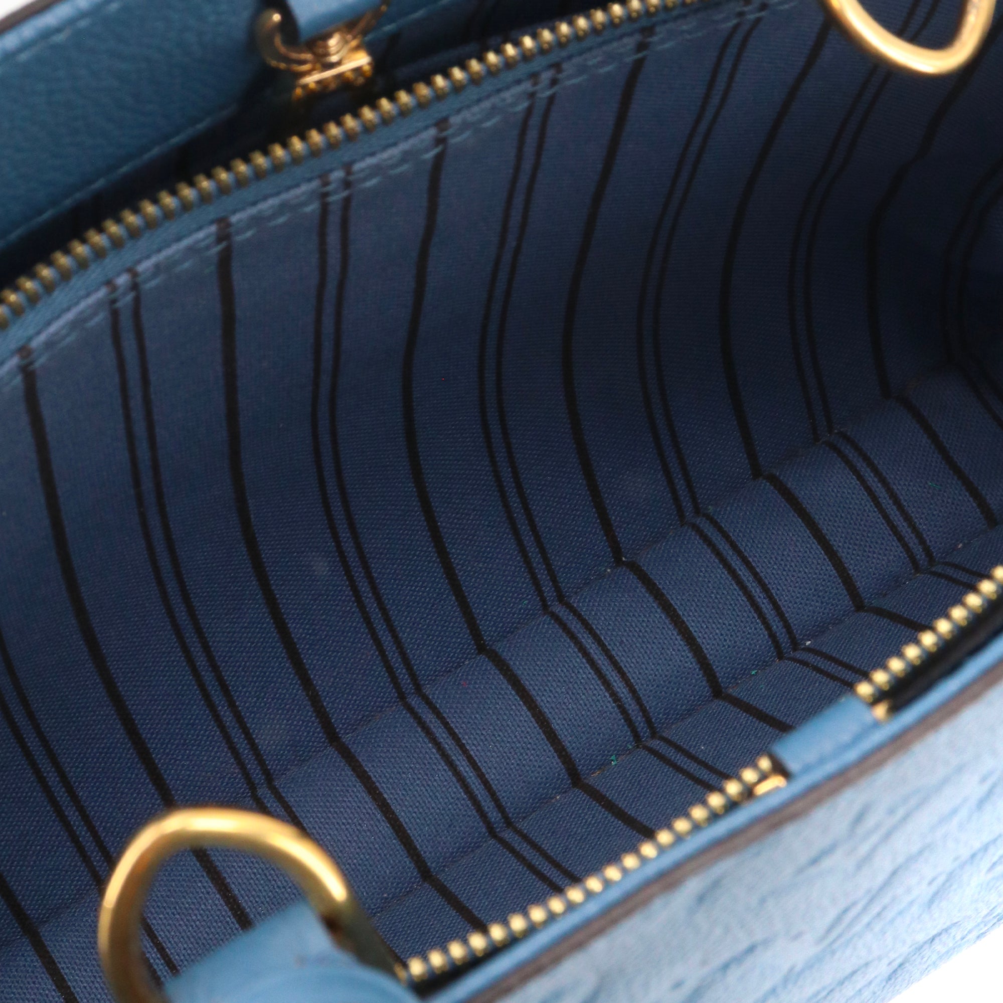 LOUIS VUITTON - Louis Vuitton Montaigne PM handbag in blue empreinte leather