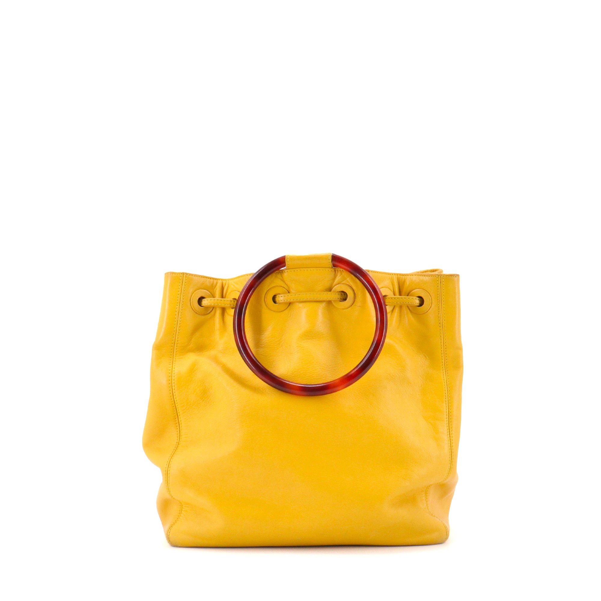CHANEL - Chanel Drawstring Ring Handle Handbag in Vintage Yellow Leather