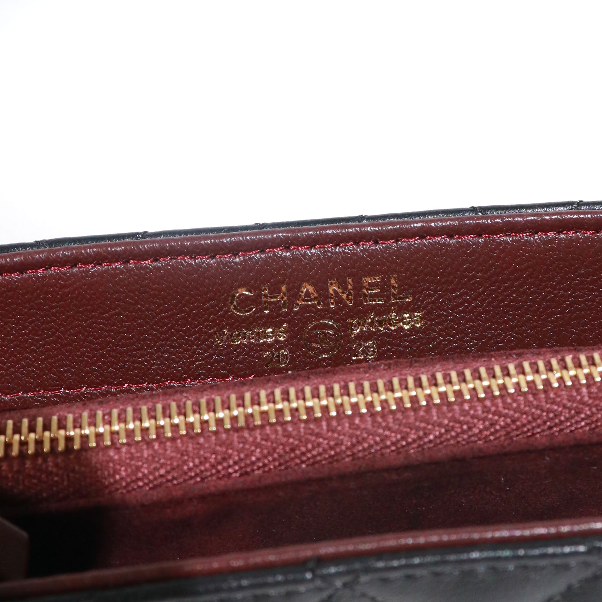CHANEL - Portefeuille Mini Clutch Classique/Timeless en cuir lisse noir