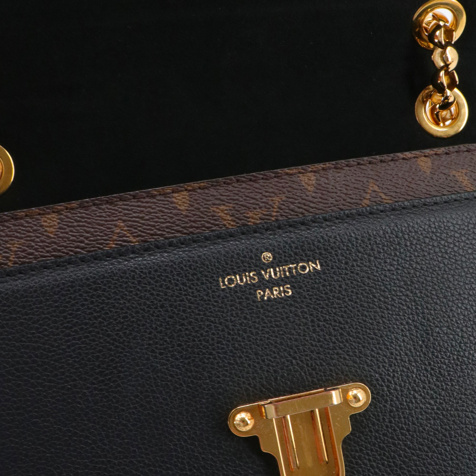 LOUIS VUITTON - Louis Vuitton Victoire shoulder bag in monogrammed canvas and black leather
