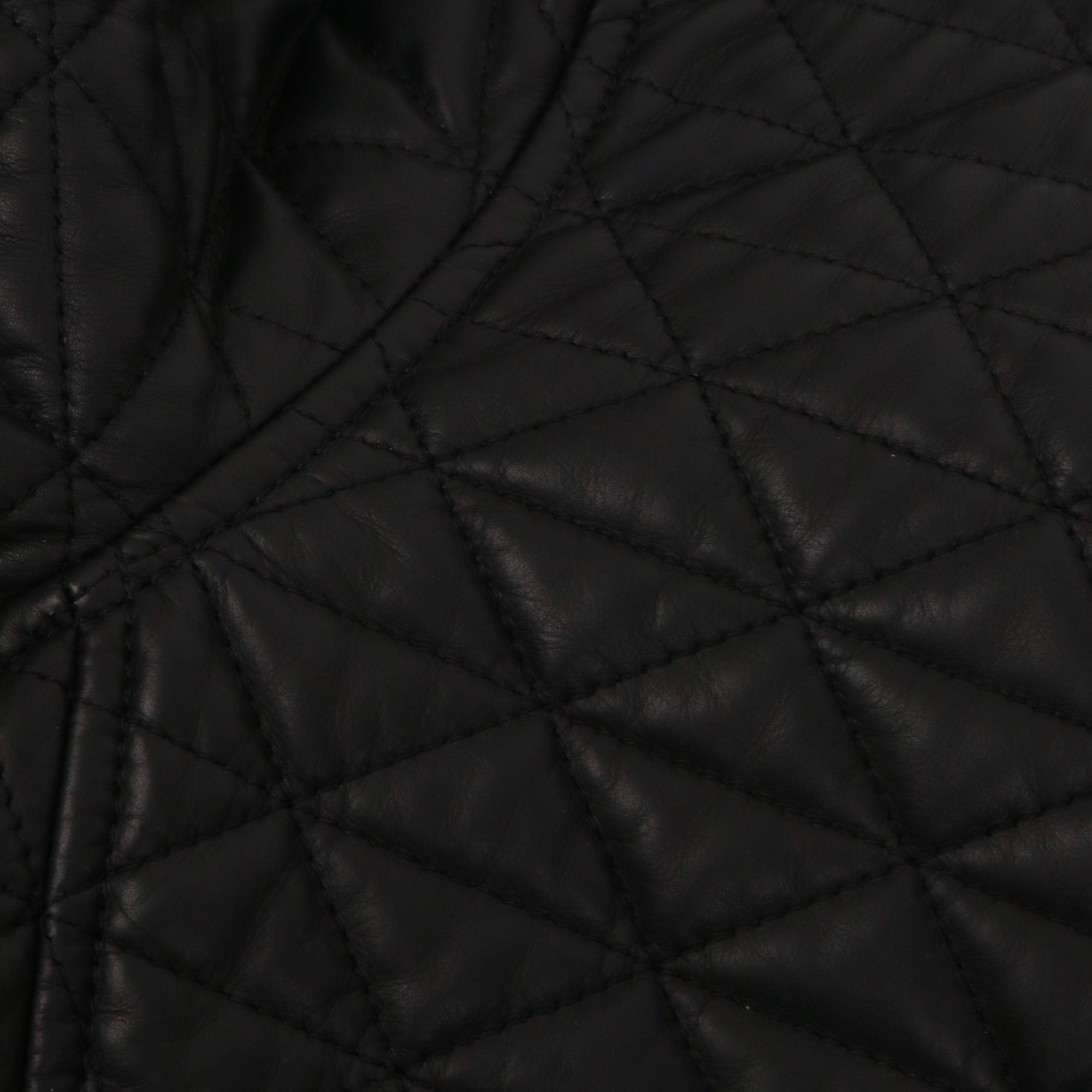 HERMÈS - Blouson Hermès en cuir matelassé noir (T34)