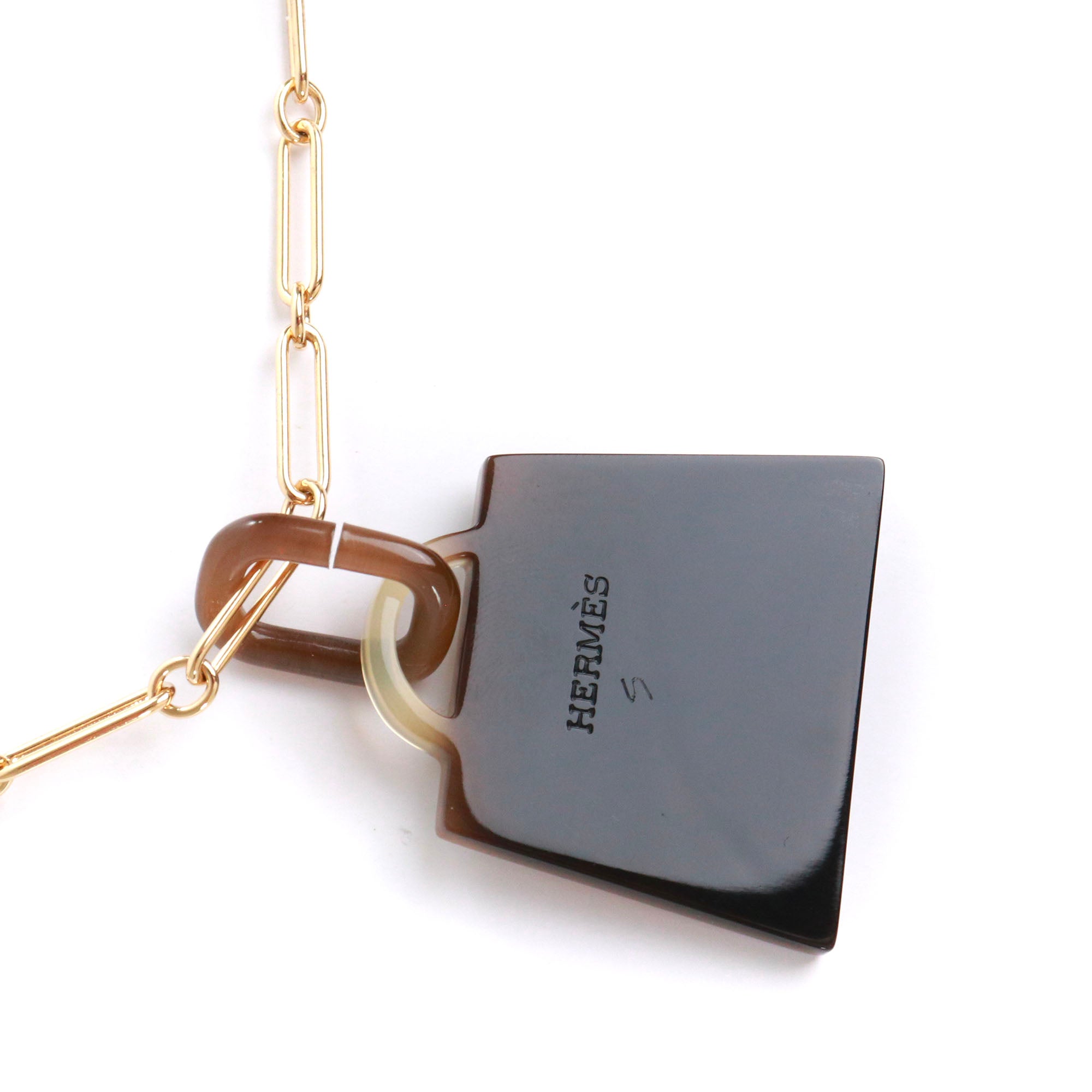 HERMÈS - Kelly Hermès Fusion Amulet pendant in horn