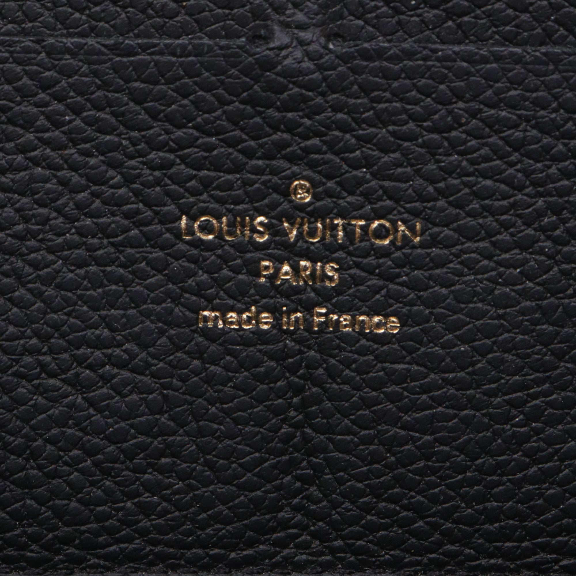 LOUIS VUITTON - Portefeuille Clémence Louis Vuitton en cuir empreinte noir