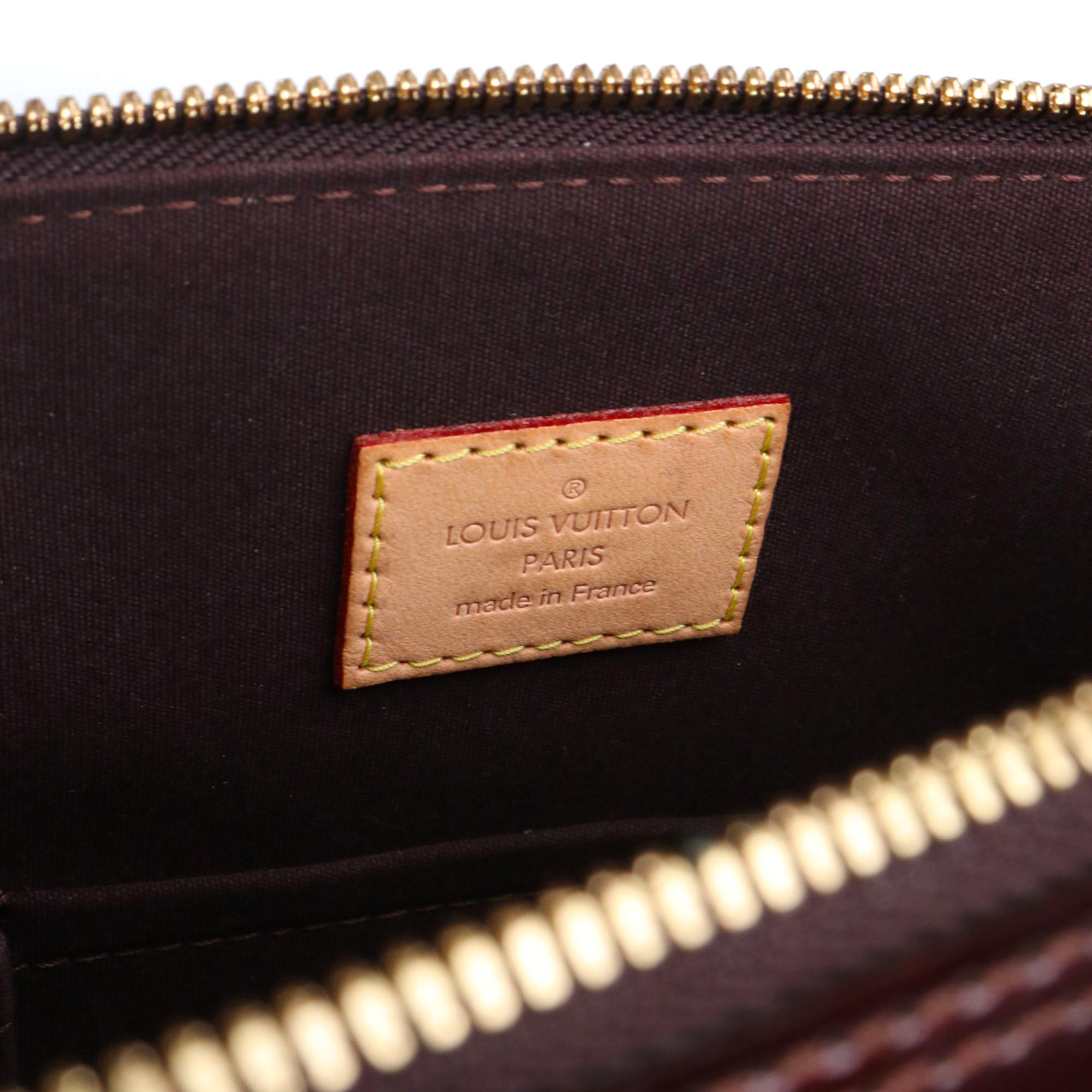 LOUIS VUITTON - Sac à main Alma PM Louis Vuitton en cuir verni bordeaux