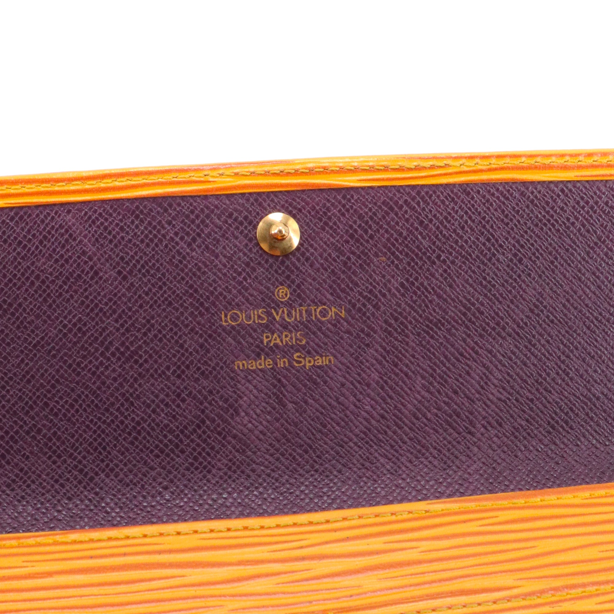 LOUIS VUITTON - Portefeuille International Louis Vuitton en cuir épi jaune