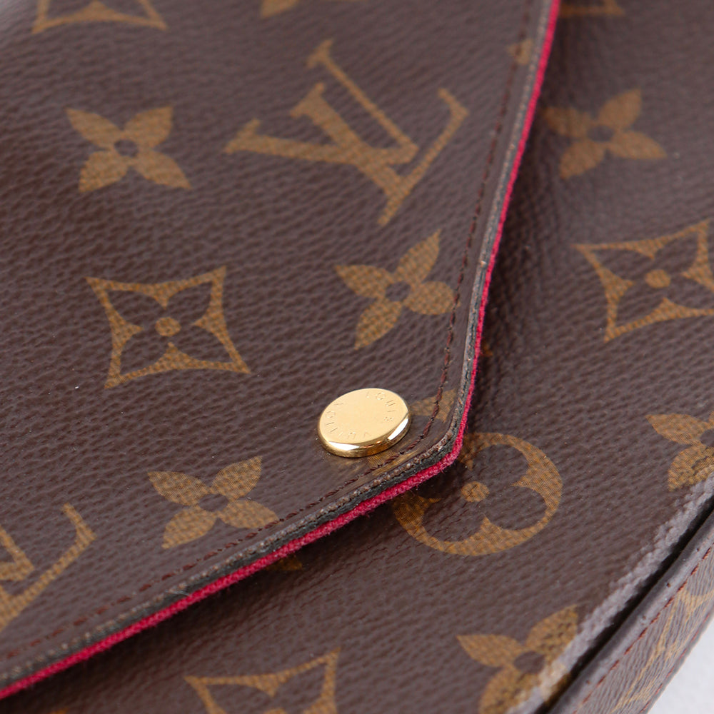 LOUIS VUITTON - Felicie clutch in monogram canvas