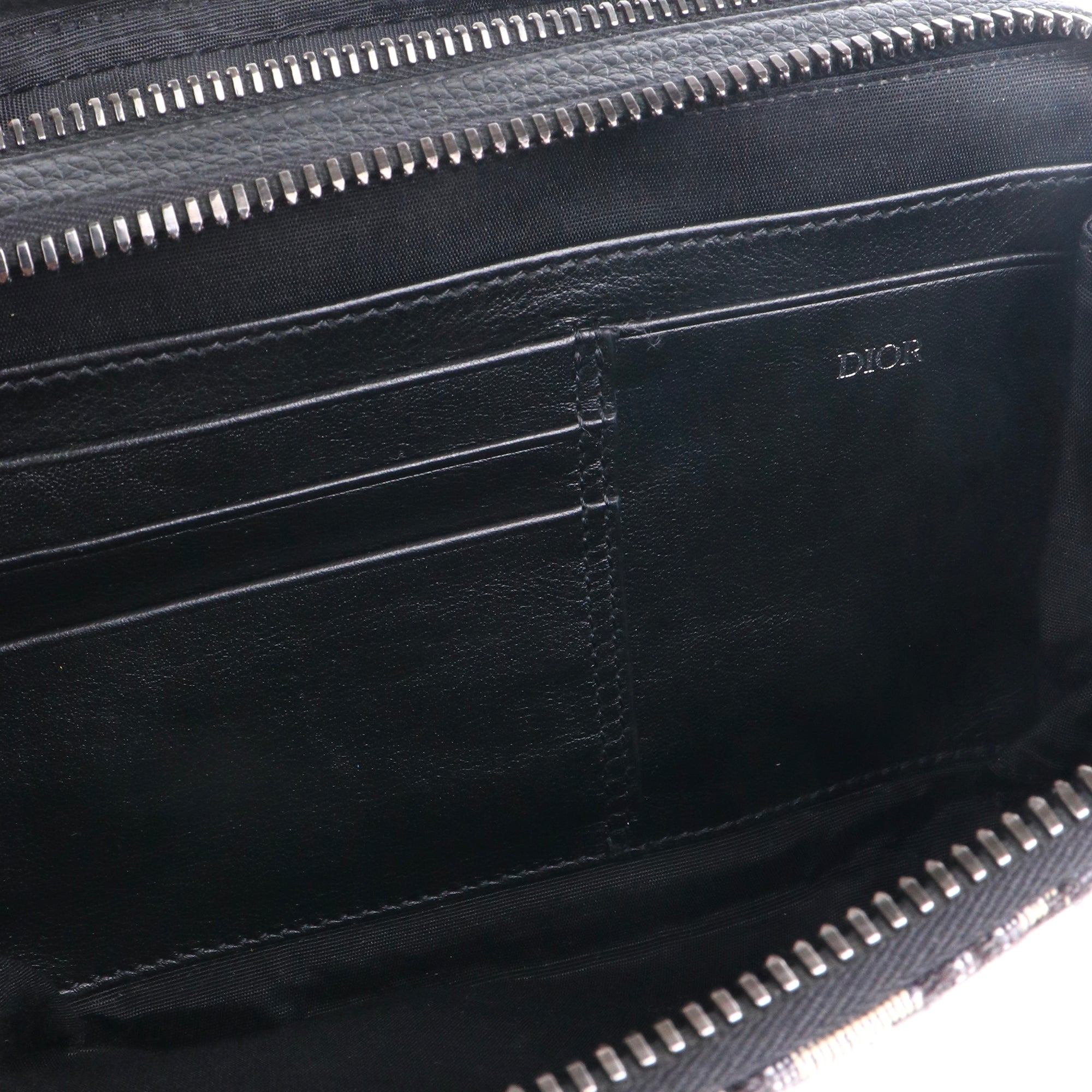 DIOR - Roller shoulder bag in navy blue grained leather