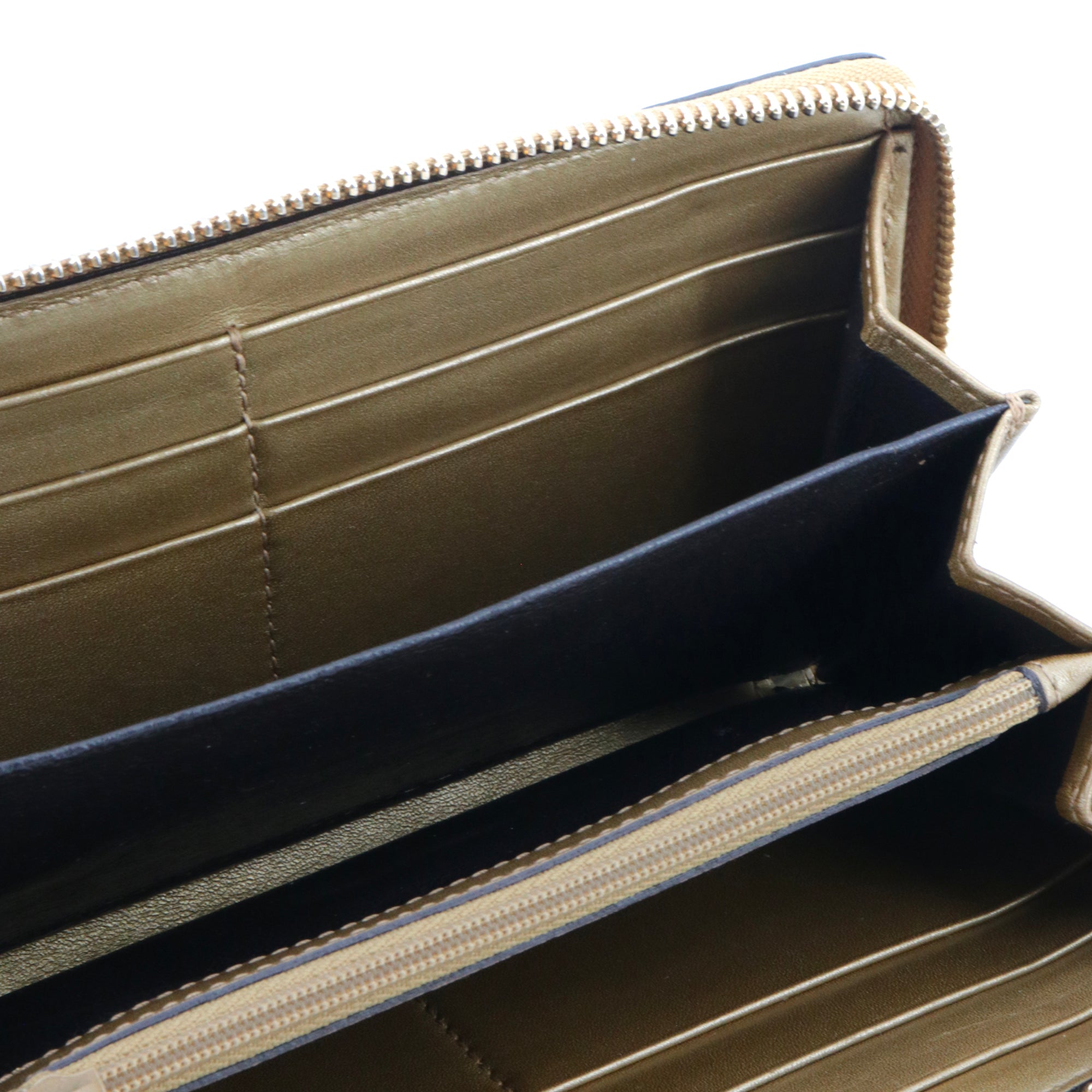 GUCCI - Grand portefeuille Gucci en cuir verni doré