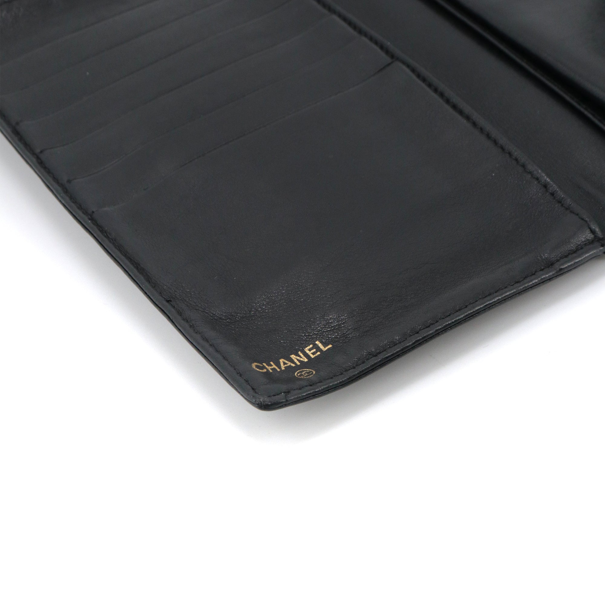 CHANEL - Black quilted leather wallet