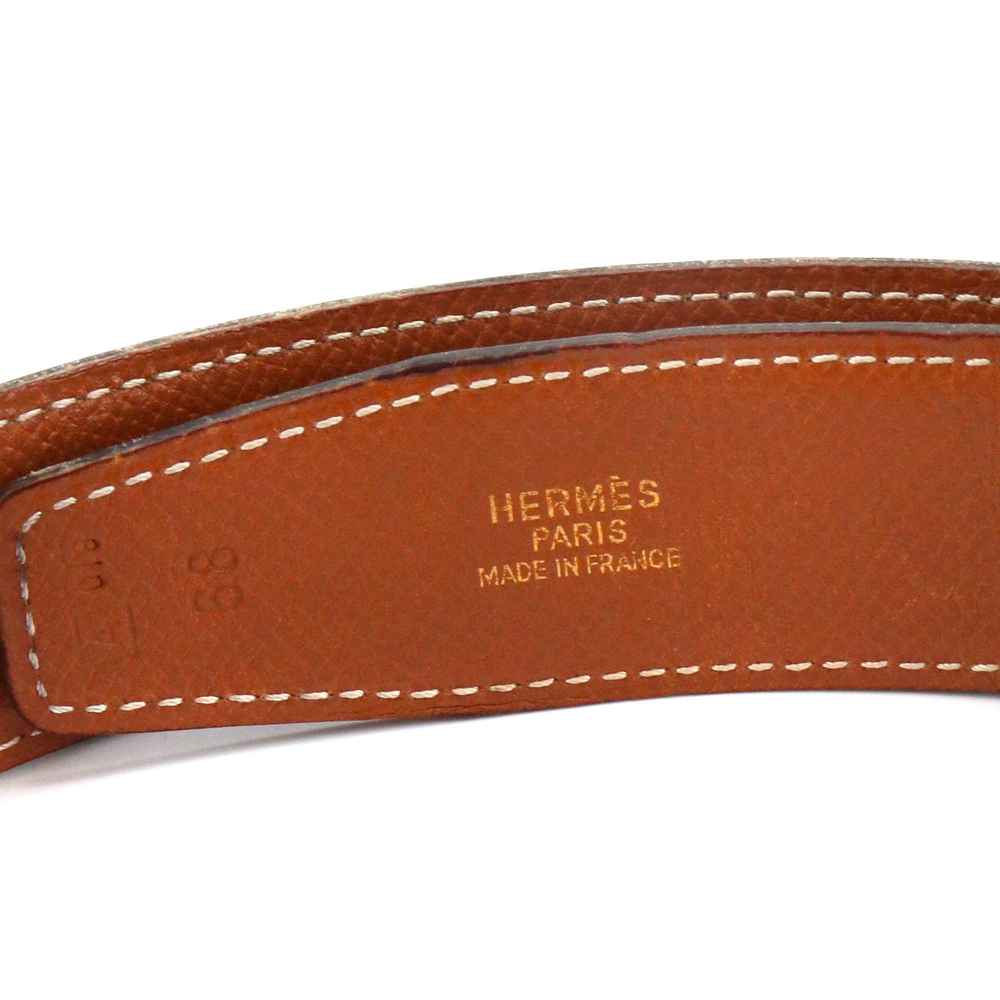 HERMÈS - Hermès reversible H belt in black and gold leather (T70)