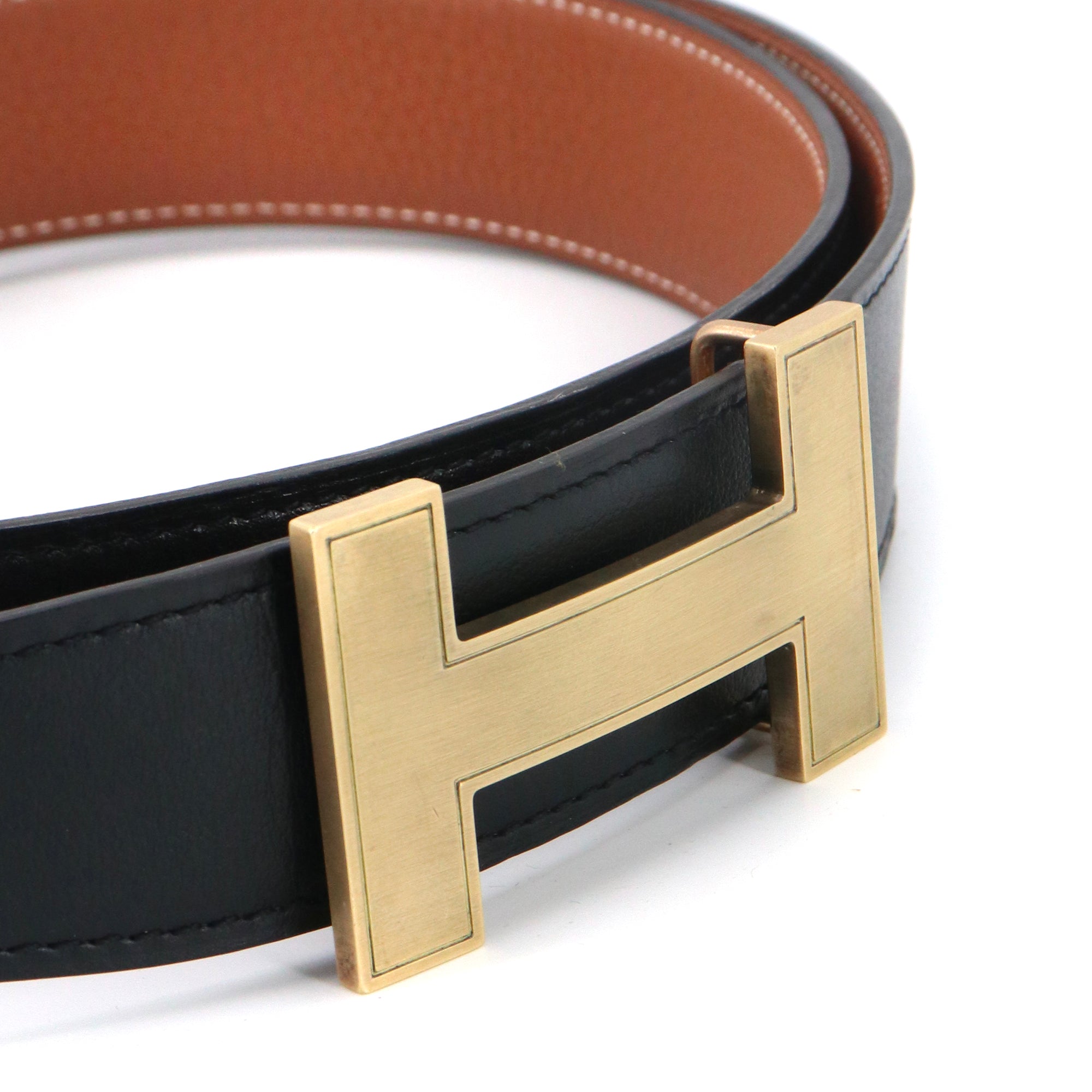 HERMÈS - Ceinture réversible H Hermès en cuir lisse noir (T90)