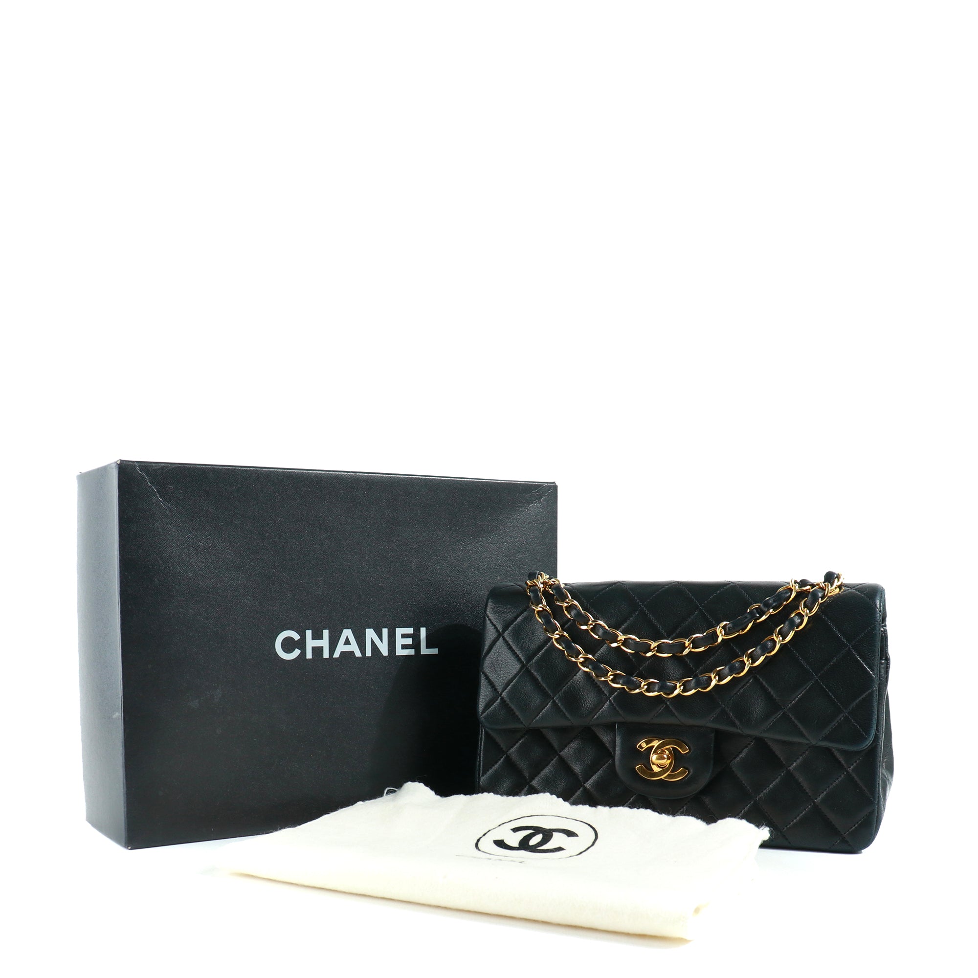 CHANEL - Sac à main Timeless 23 double flap en cuir matelassé noir vintage