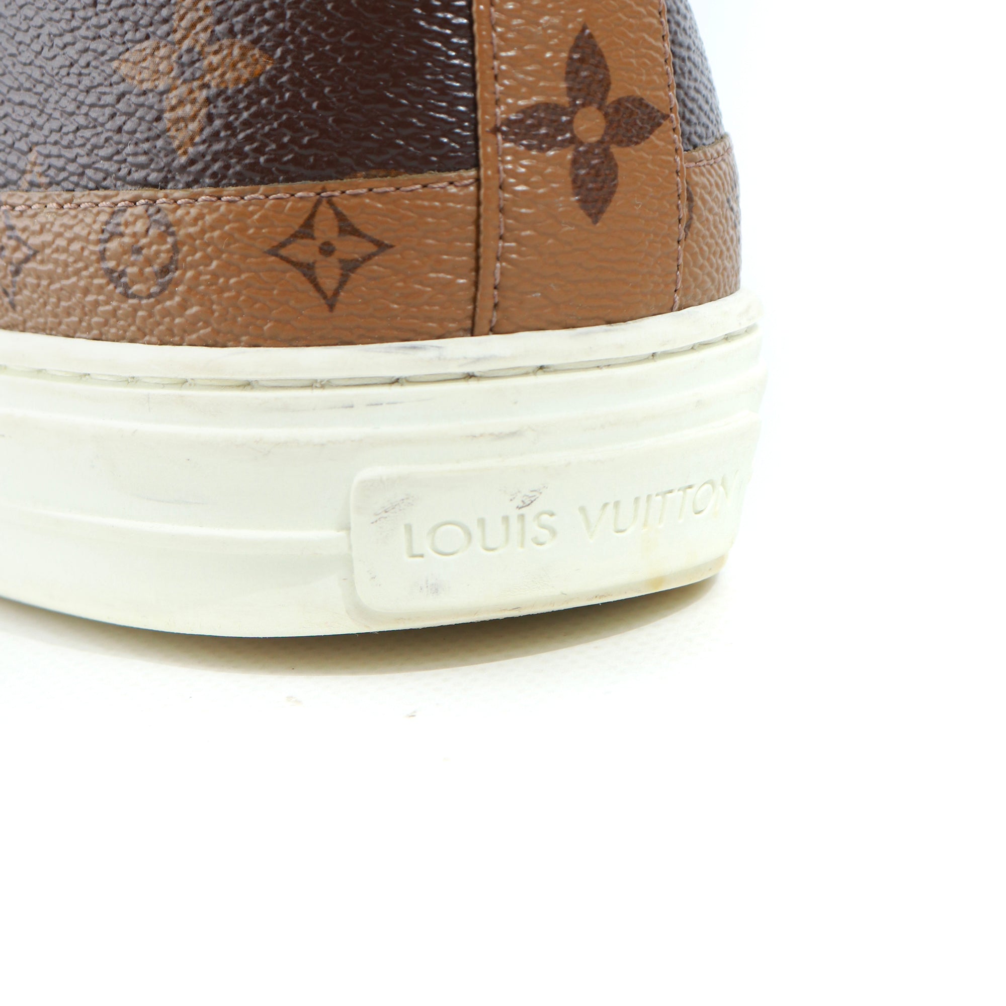 LOUIS VUITTON - Sneakers montantes en toile enduite monogrammée (T40)