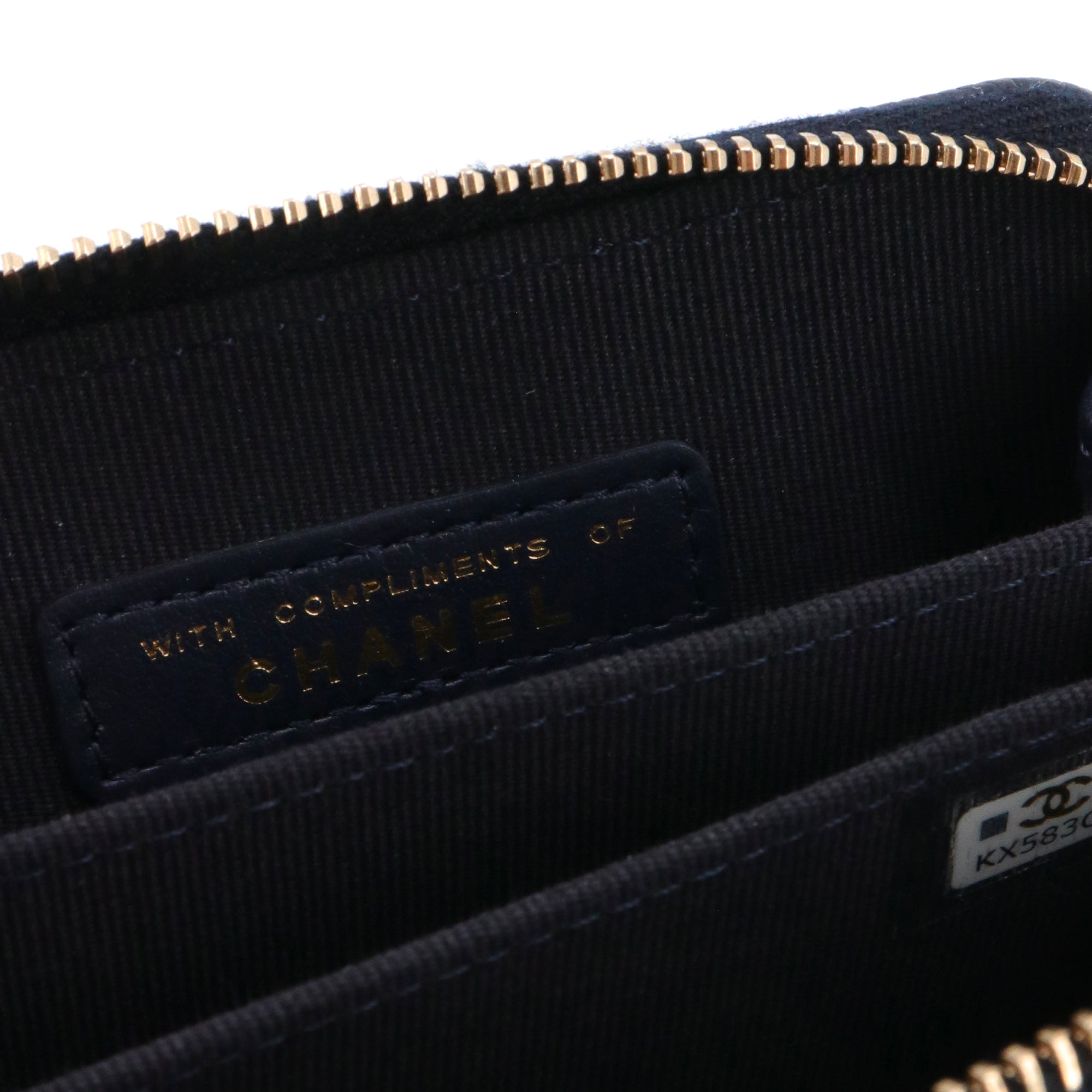 CHANEL - Porte-monnaie Chanel en cuir caviar bleu marine édition limitée poker