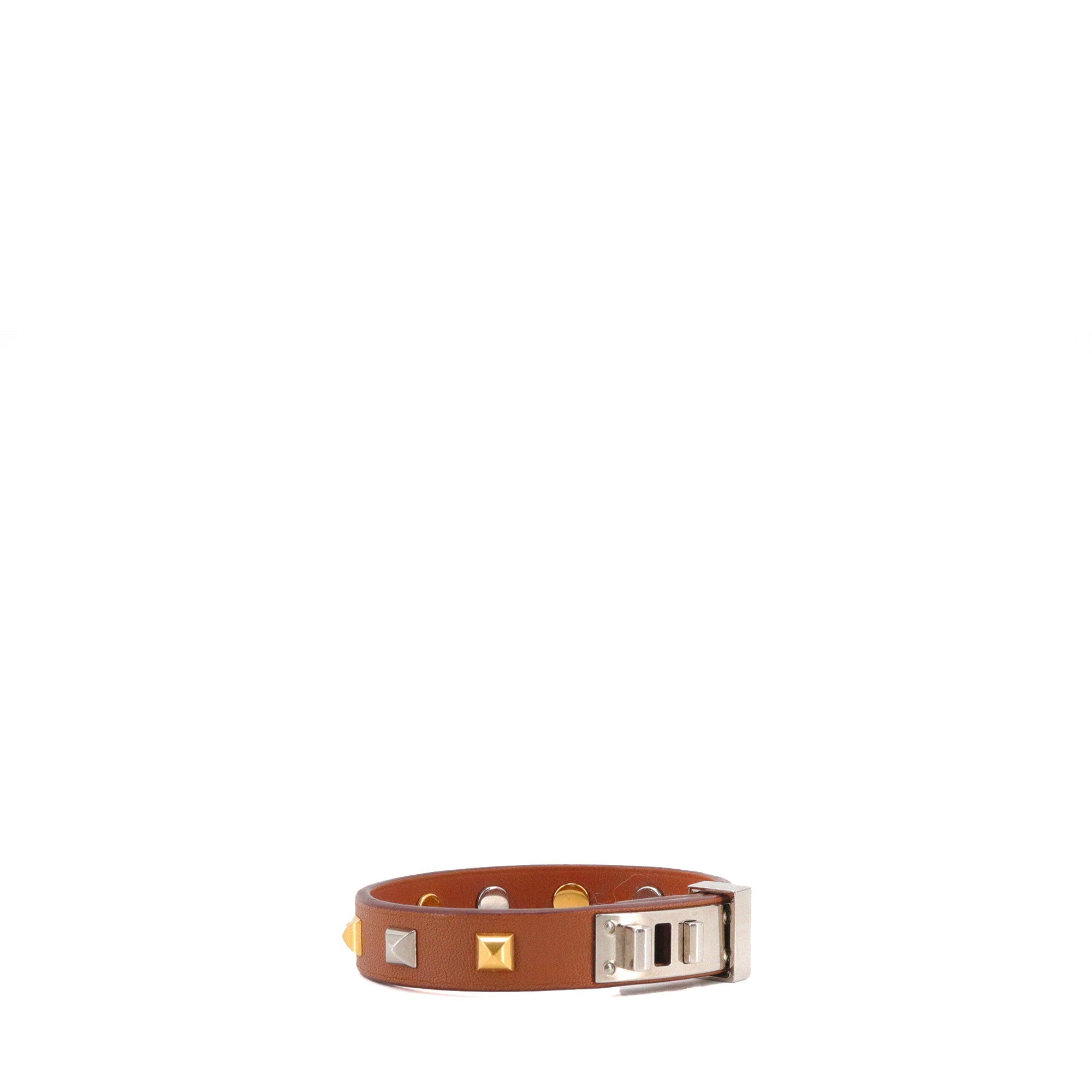 HERMÈS - Mini Dog Hermès bracelet in gold leather (T3)