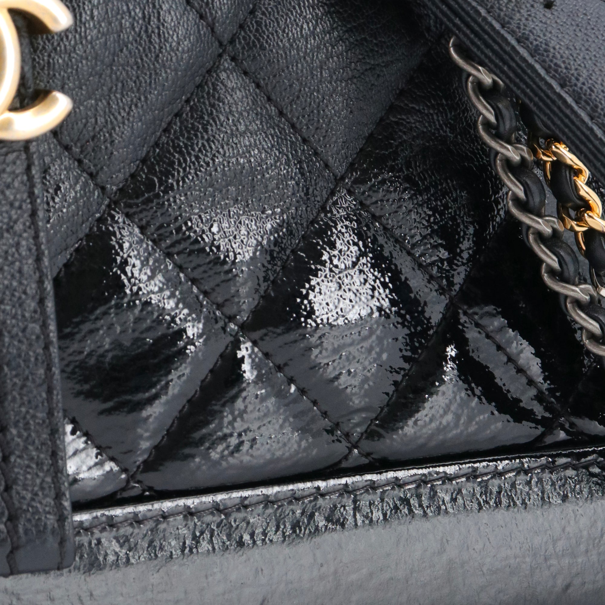 CHANEL - Chanel Gabrielle mini shoulder bag in black smooth and patent leather