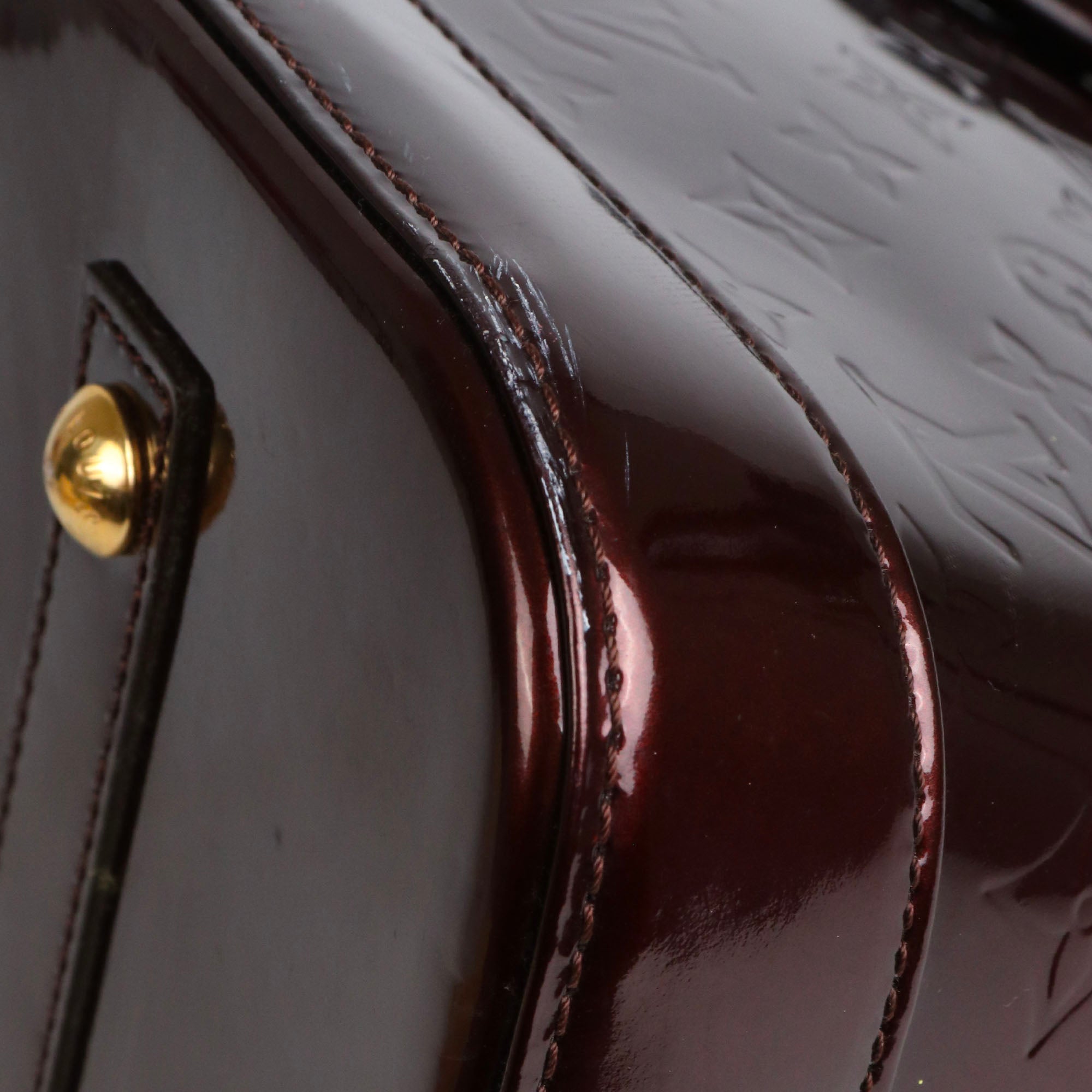 LOUIS VUITTON - Sac à main Alma PM Louis Vuitton en cuir verni bordeaux