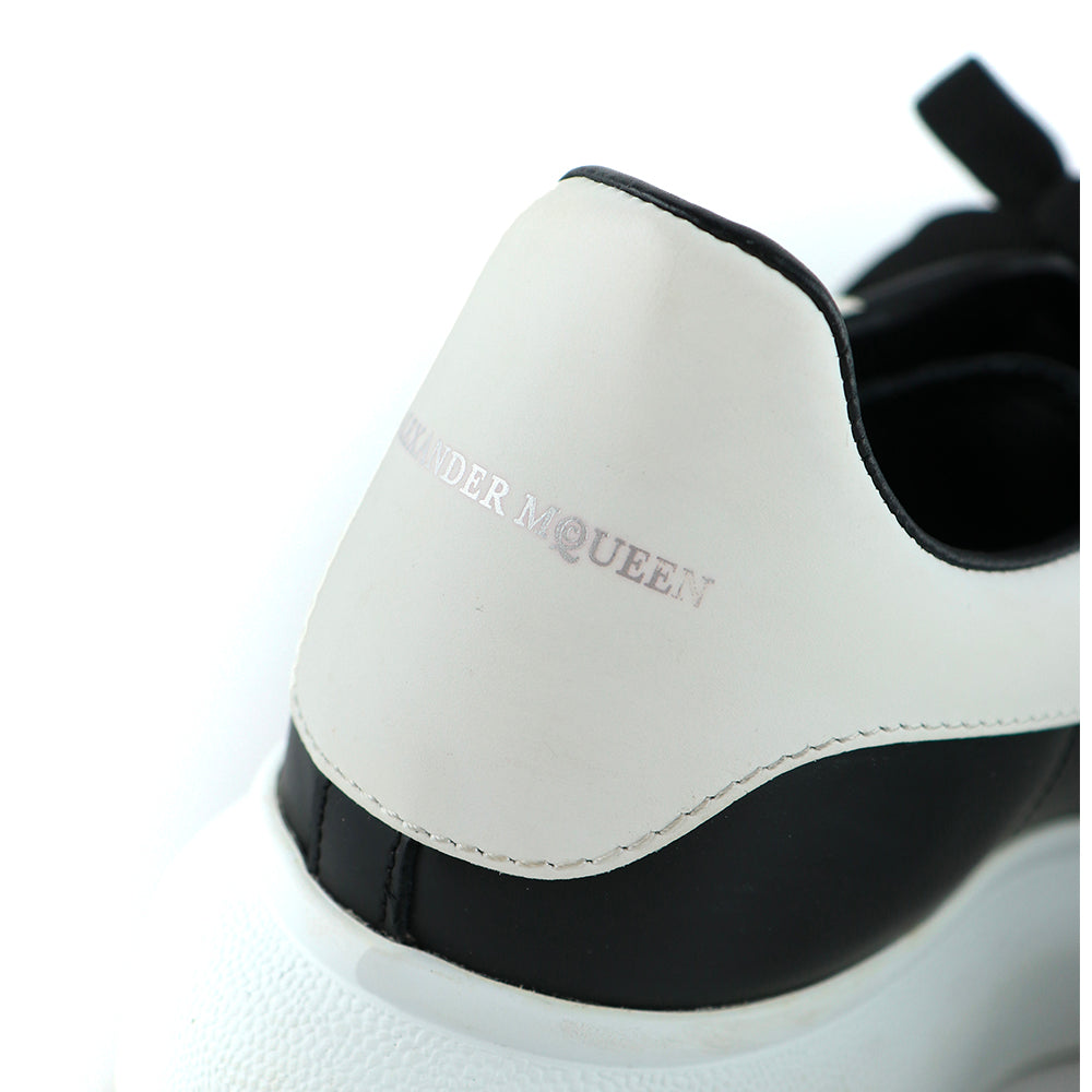ALEXANDER MCQUEEN - Oversize sneakers in black leather (T39)