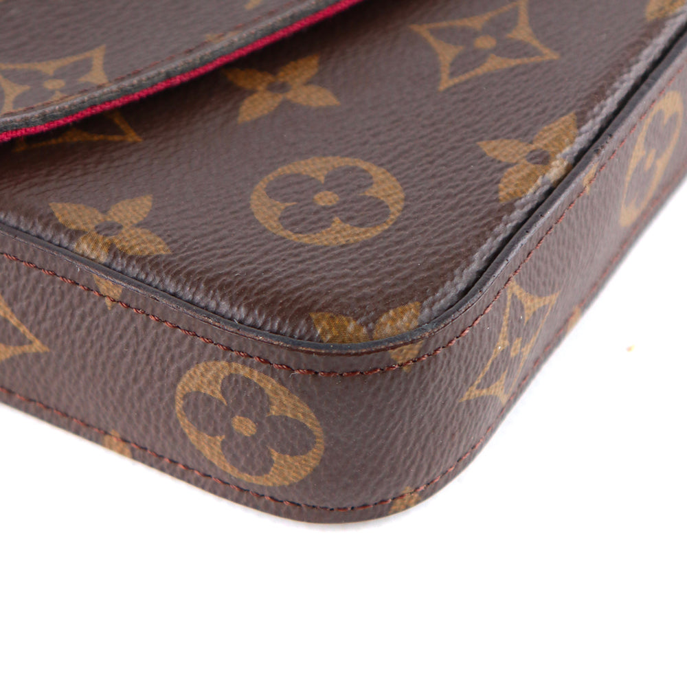 LOUIS VUITTON - Felicie clutch in monogram canvas