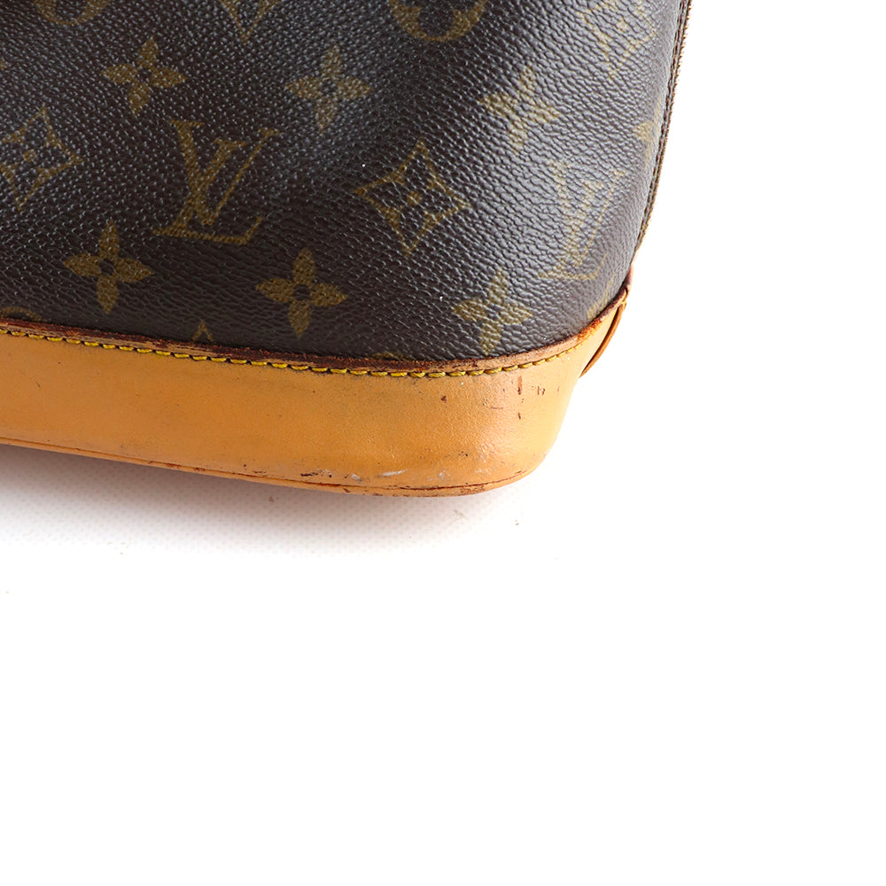 LOUIS VUITTON - Sac à main Alma PM en toile monogramme