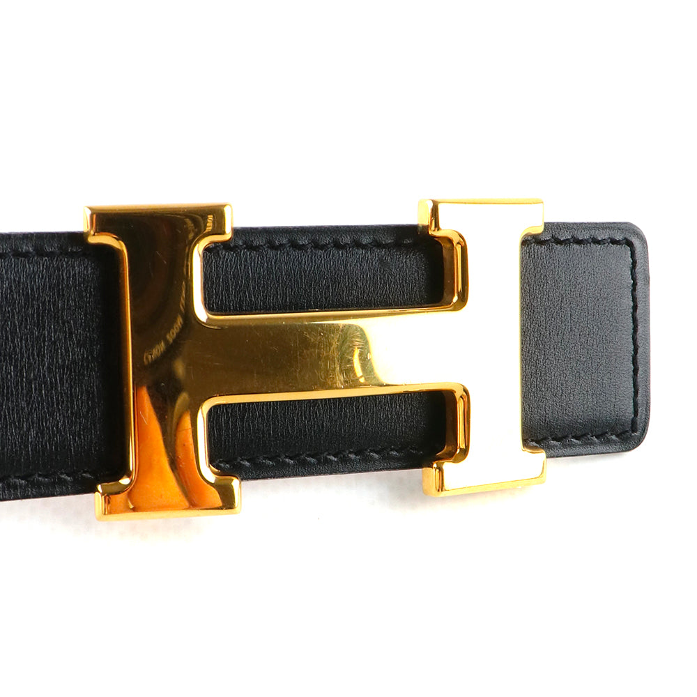 HERMÈS - Ceinture réversible H avec boucle dorée (T65)
