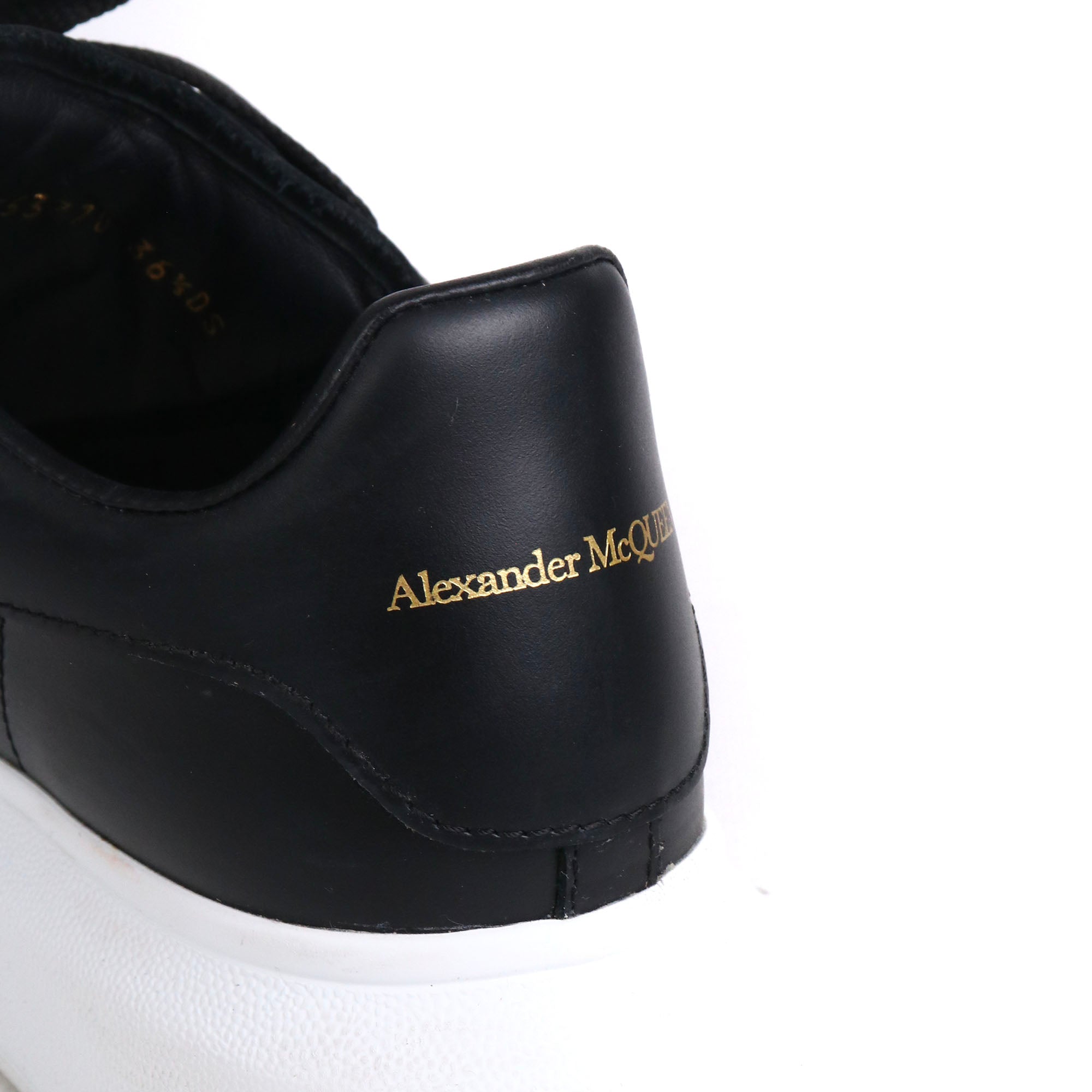 ALEXANDER MCQUEEN - Oversize sneakers in black leather (T39)